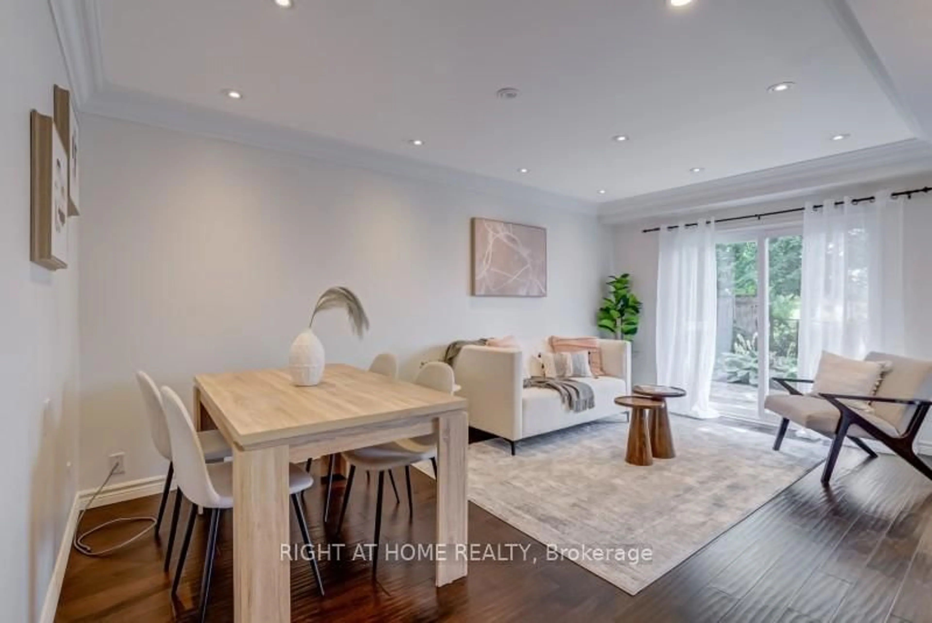 Living room with furniture, wood/laminate floor for 742 Beman Dr, Newmarket Ontario L3Y 4Z2