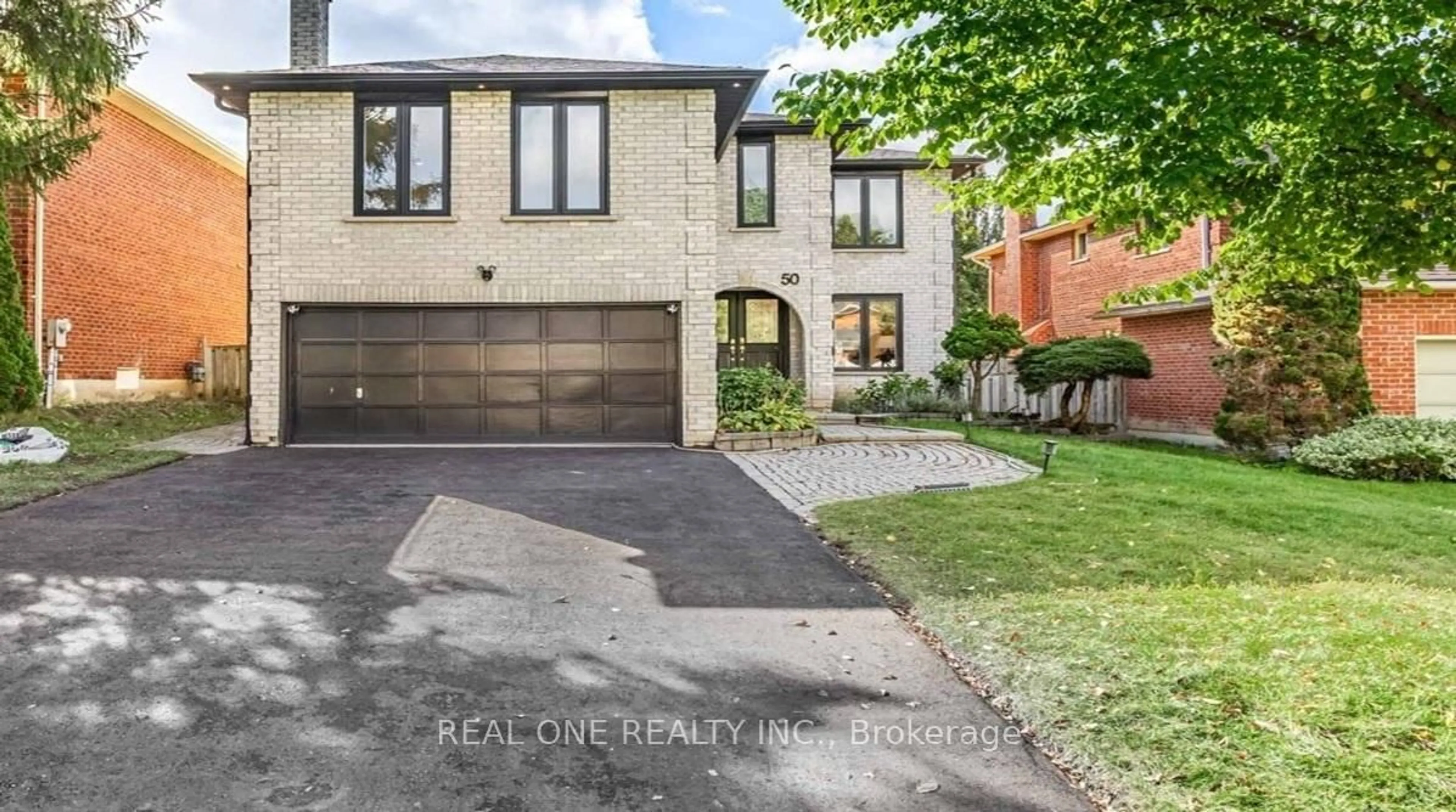 Home with brick exterior material, street for 50 Bryant Rd, Markham Ontario L3P 5Z2
