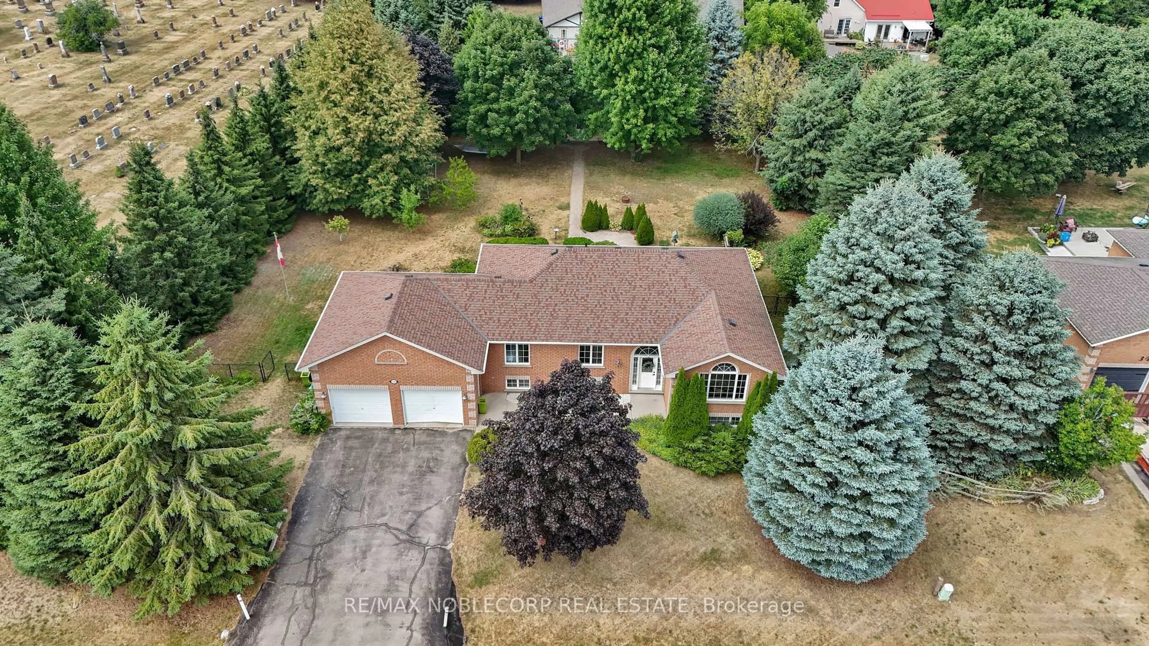 A pic from outside/outdoor area/front of a property/back of a property/a pic from drone, street for 1 Dekker St, Adjala-Tosorontio Ontario L0M 1J0