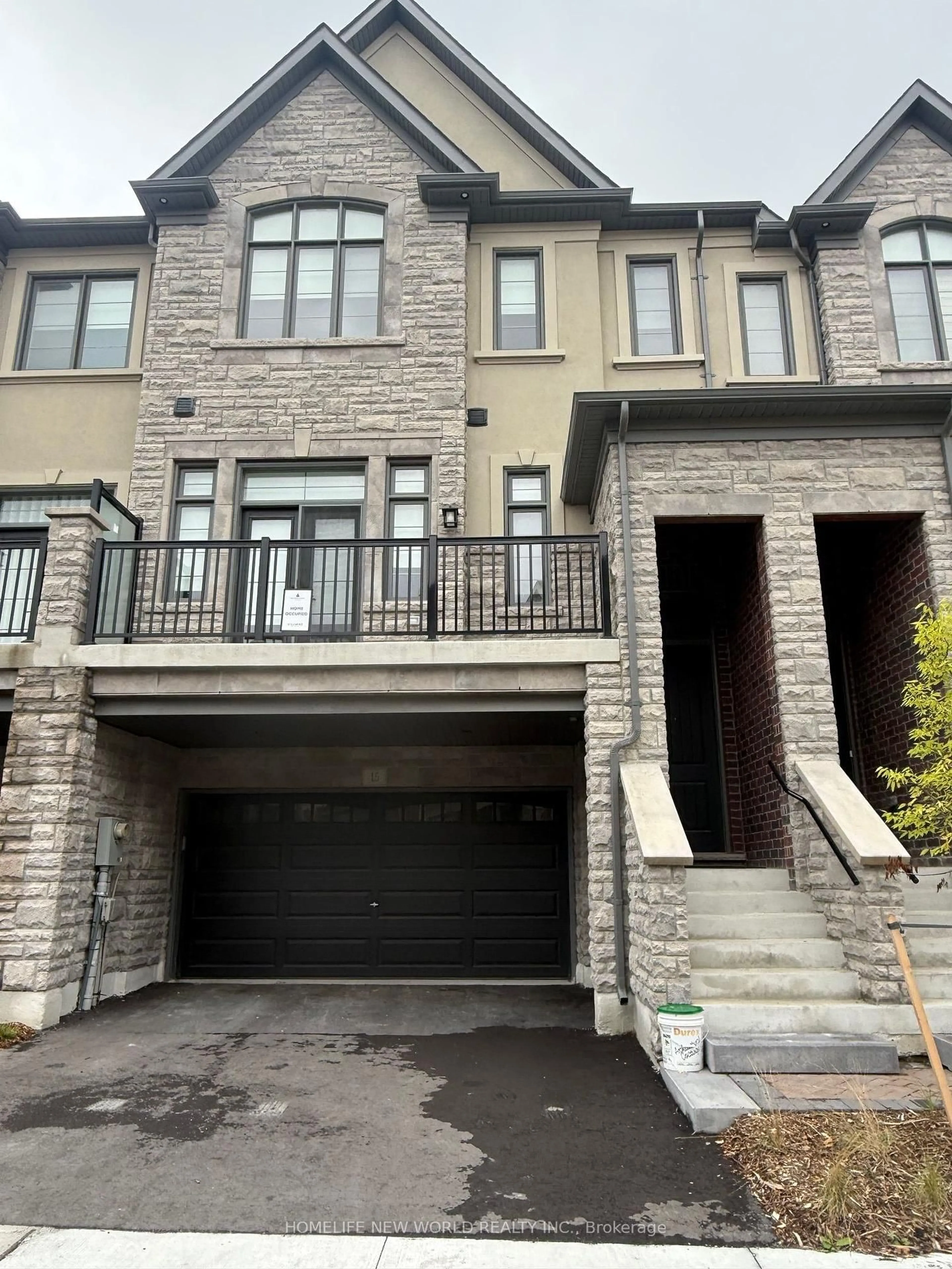 Home with brick exterior material, street for 15 West Village Lane, Markham Ontario L6C 1K4