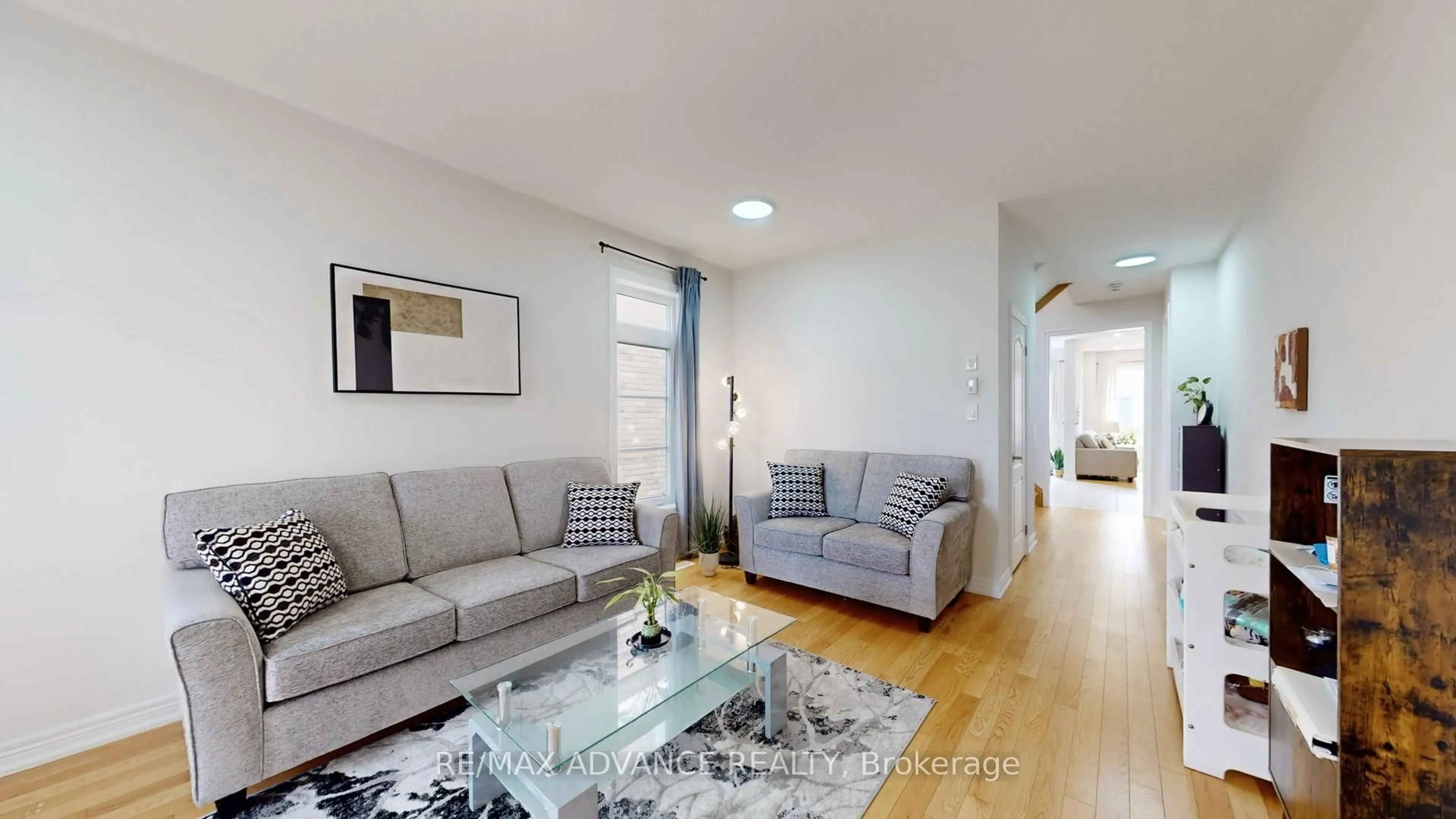 Living room with furniture, unknown for 127 Decast Cres, Markham Ontario L6B 1N8