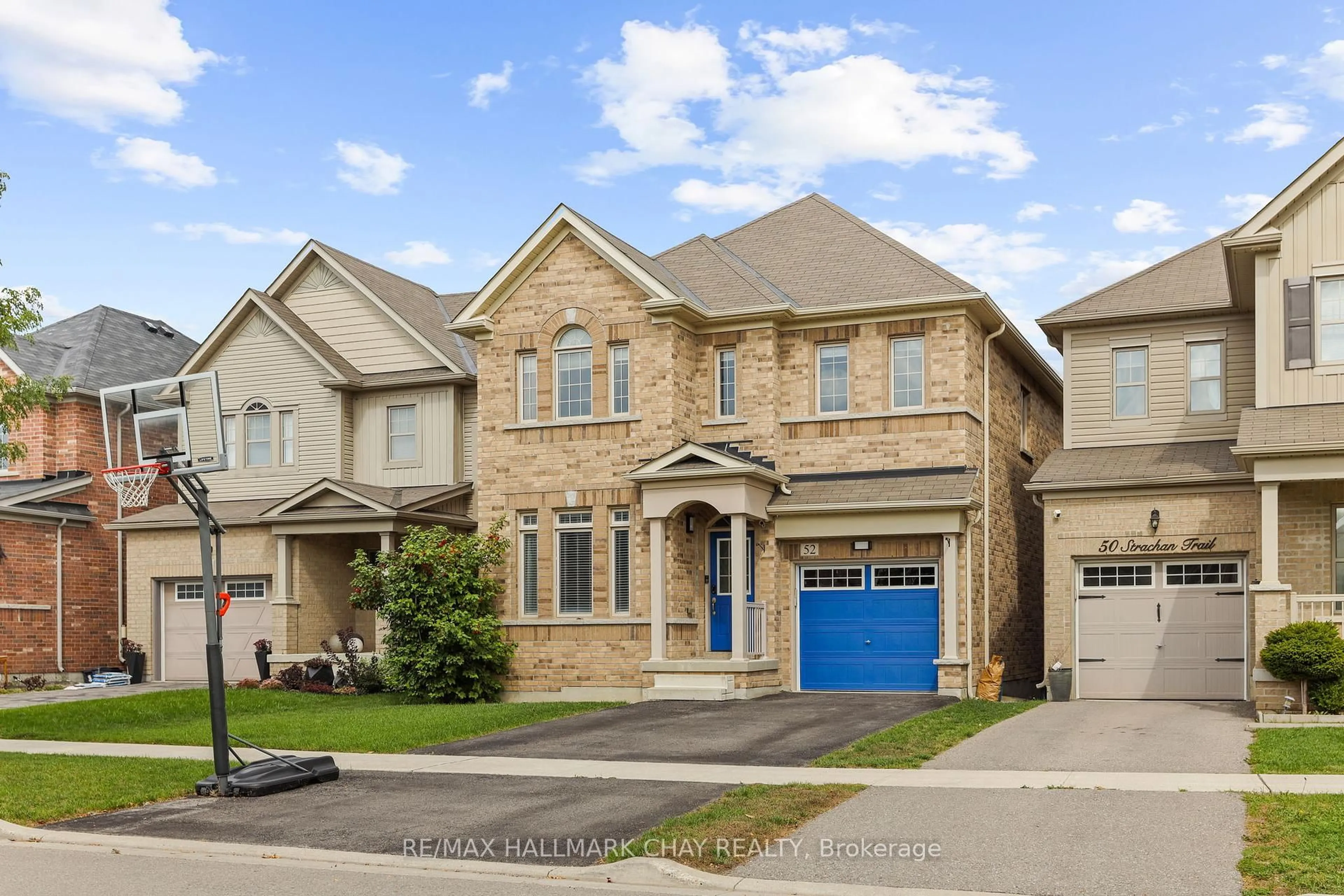 Home with brick exterior material, street for 52 Strachan Tr, New Tecumseth Ontario L0G 1A0