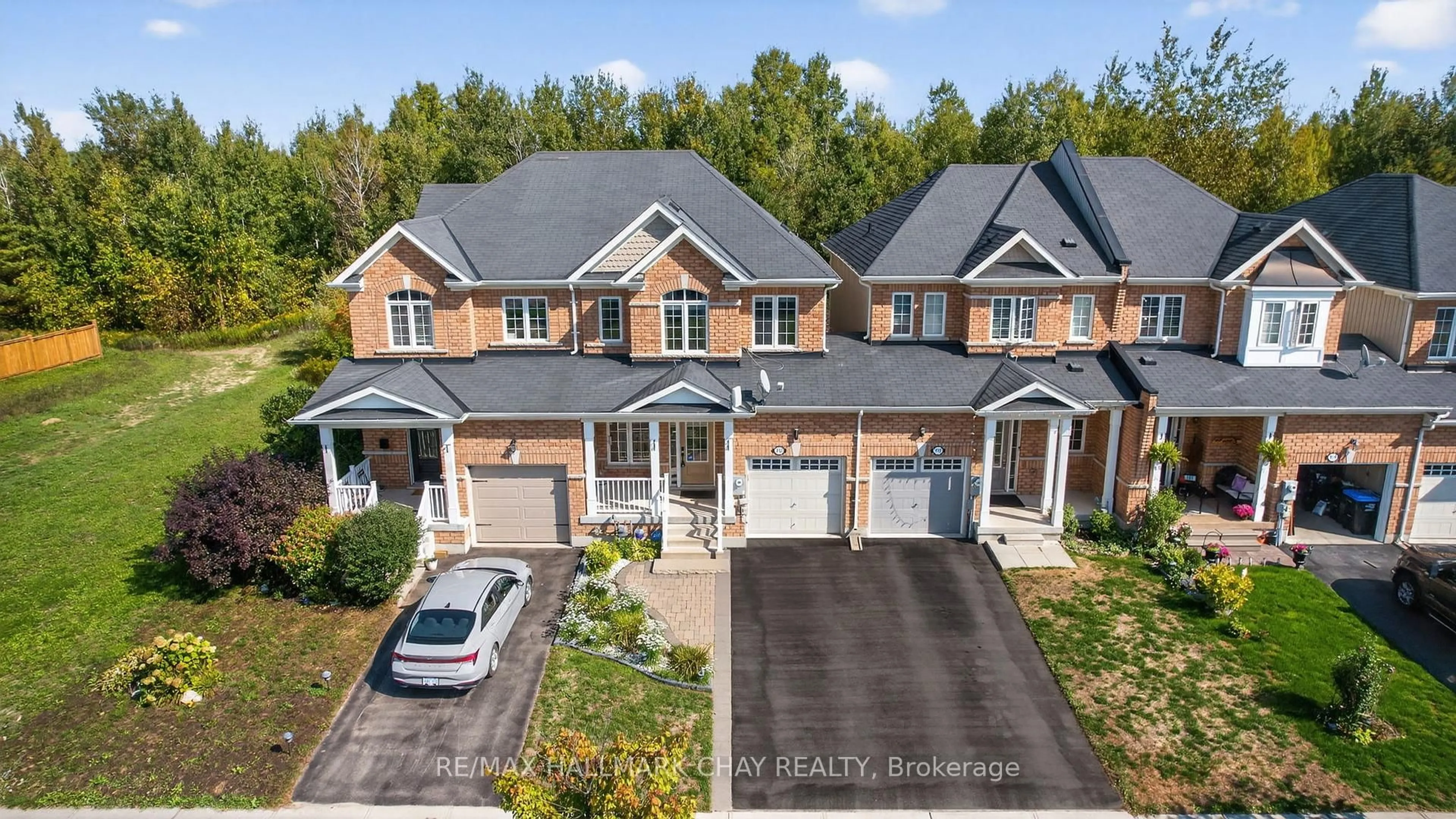 A pic from outside/outdoor area/front of a property/back of a property/a pic from drone, street for 115 Collier Cres, Essa Ontario L0M 1B5