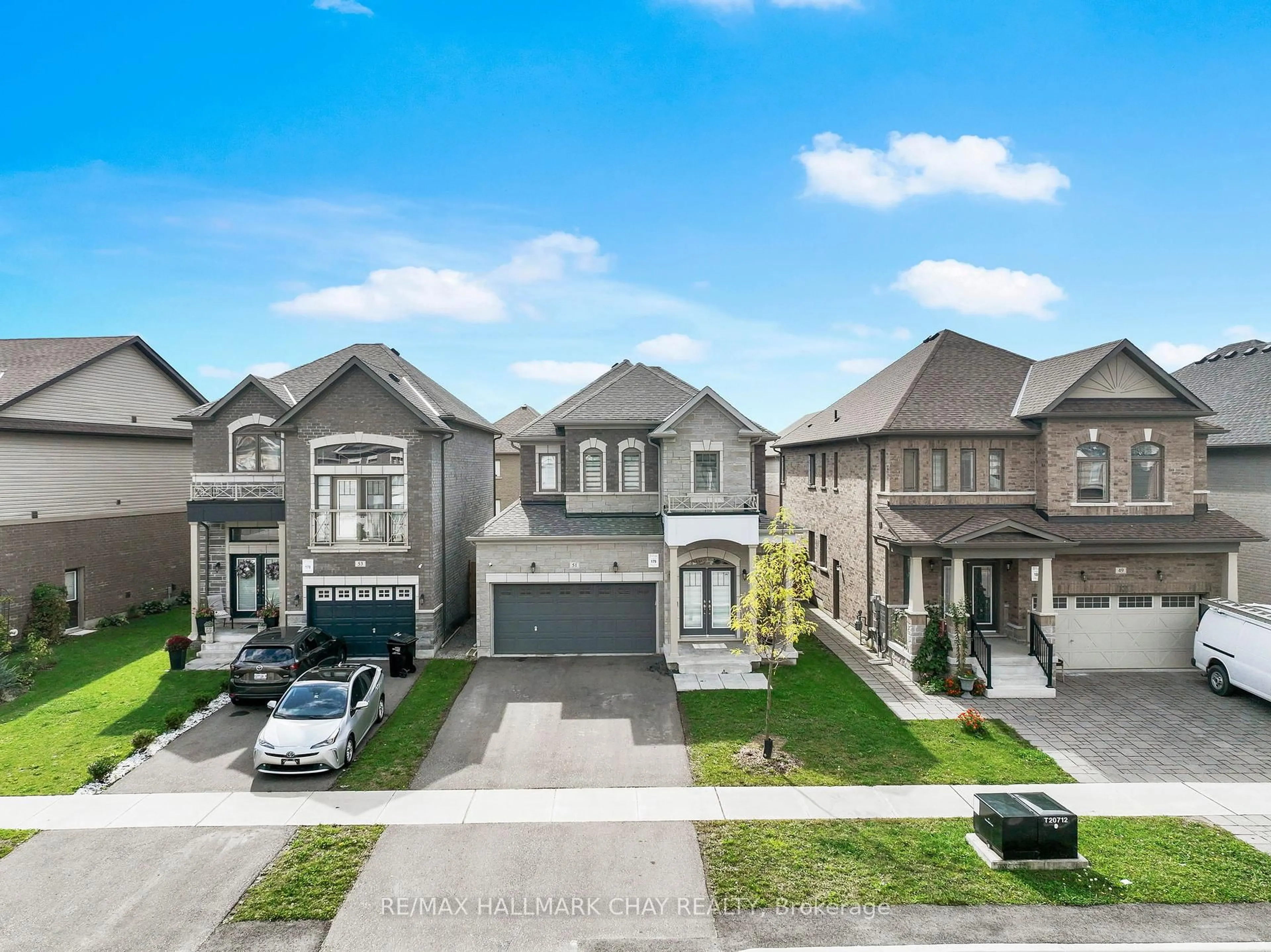 A pic from outside/outdoor area/front of a property/back of a property/a pic from drone, street for 51 Peacock Tr, New Tecumseth Ontario L9R 0T7