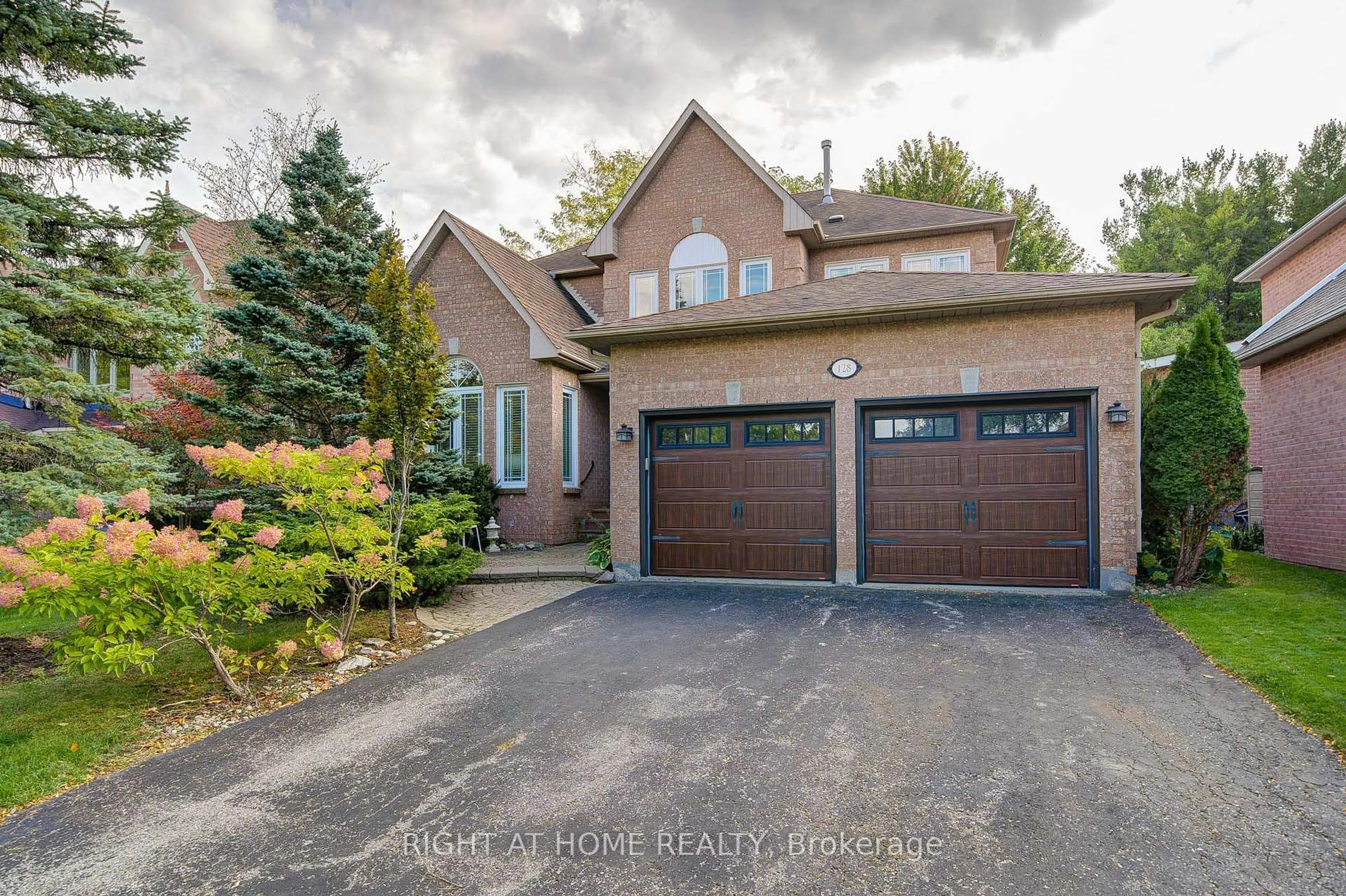 Home with brick exterior material, street for 128 Carlyle Cres, Aurora Ontario L4G 6P7