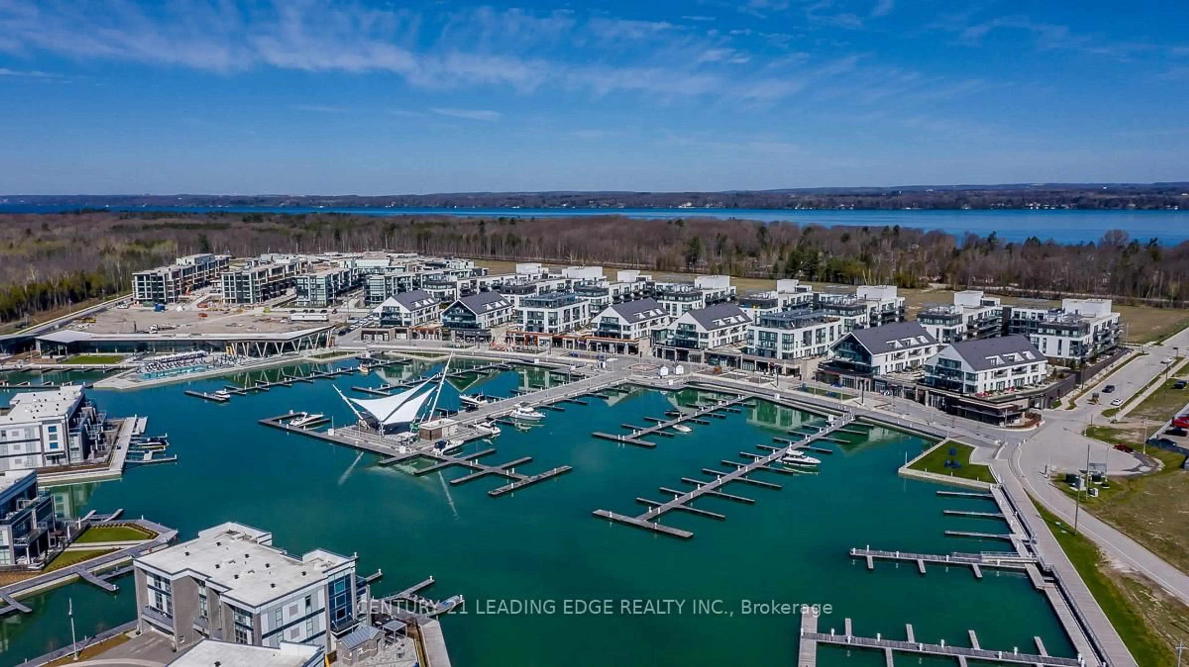 A pic from outside/outdoor area/front of a property/back of a property/a pic from drone, water/lake/river/ocean view for 303 Broward Way #97, Innisfil Ontario L9S 0M5
