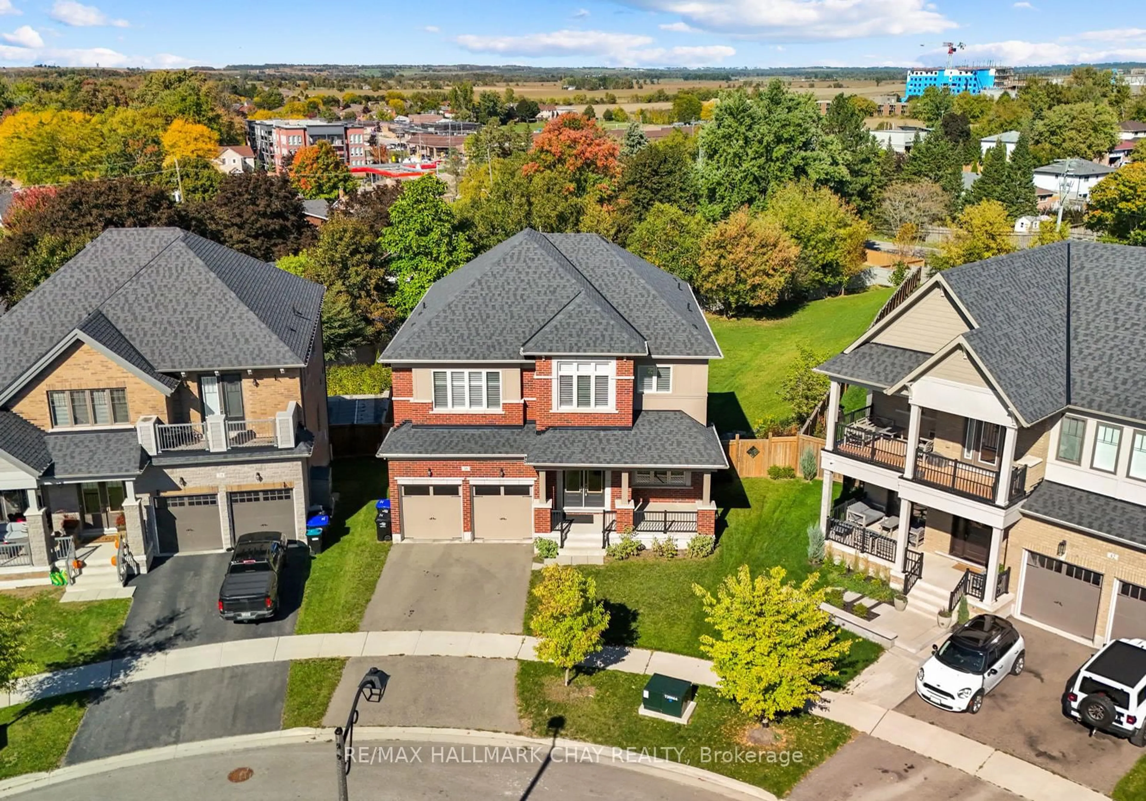 A pic from outside/outdoor area/front of a property/back of a property/a pic from drone, street for 38 Gould Cres, New Tecumseth Ontario L0G 1A0