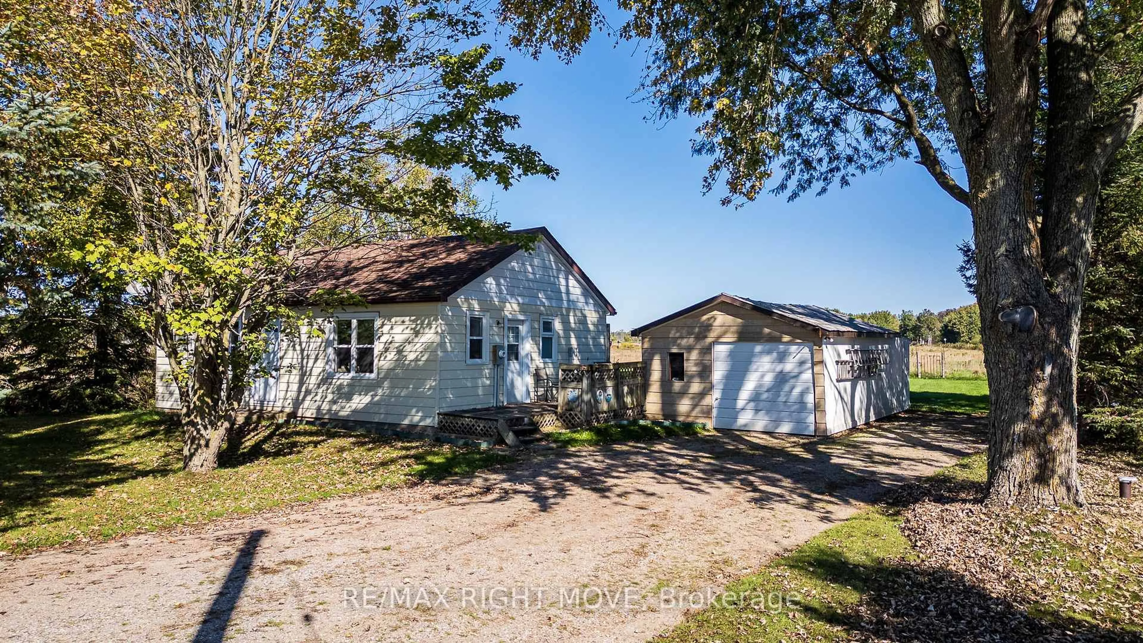 A pic from outside/outdoor area/front of a property/back of a property/a pic from drone, street for 8785 10th Line, Essa Ontario L4M 4S4