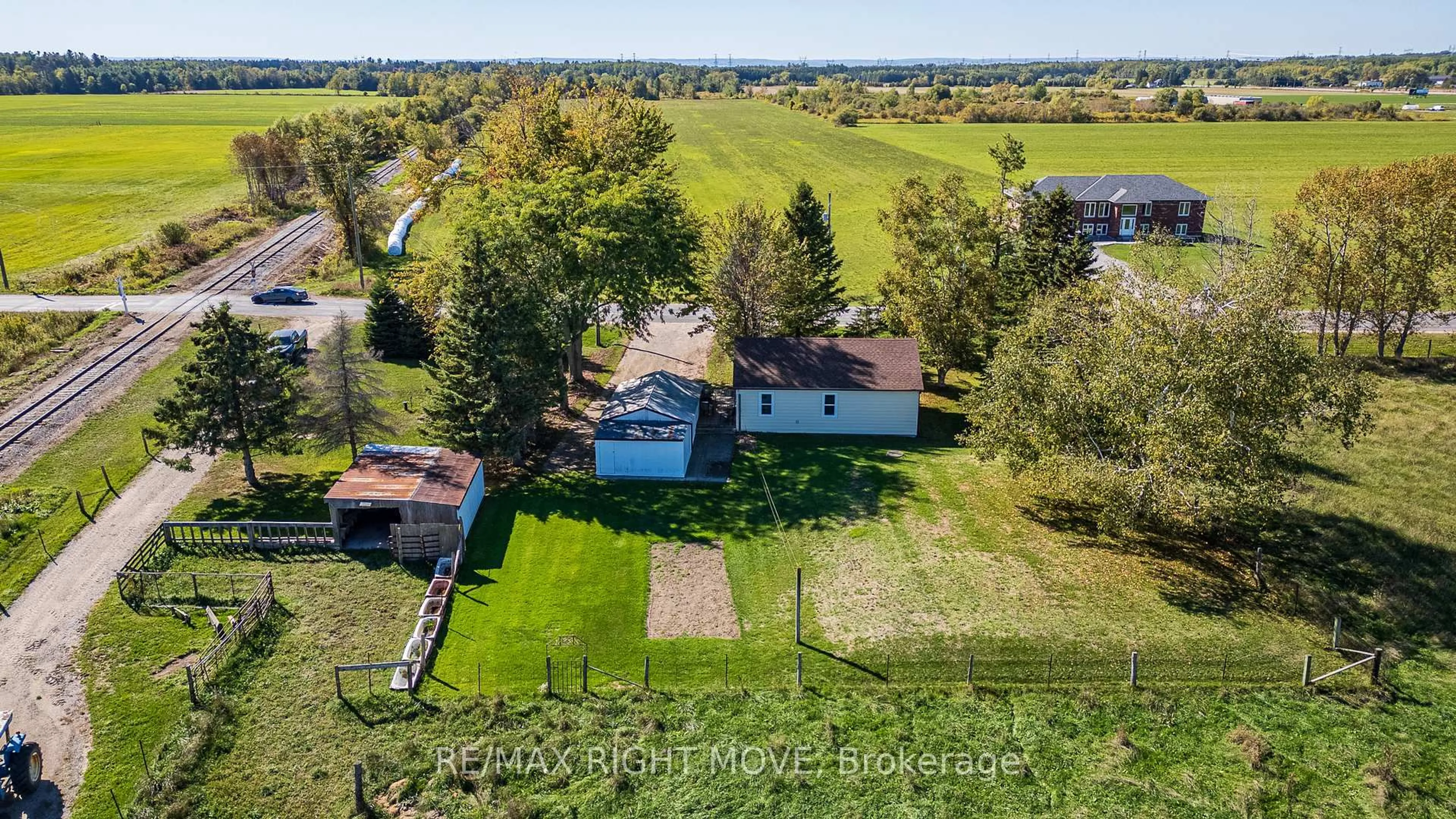 A pic from outside/outdoor area/front of a property/back of a property/a pic from drone, water/lake/river/ocean view for 8785 10th Line, Essa Ontario L4M 4S4
