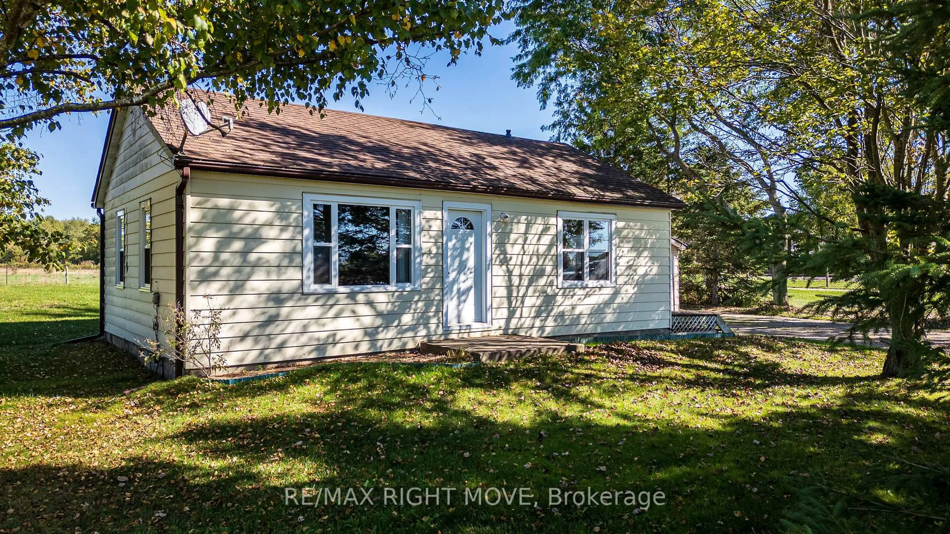A pic from outside/outdoor area/front of a property/back of a property/a pic from drone, street for 8785 10th Line, Essa Ontario L4M 4S4