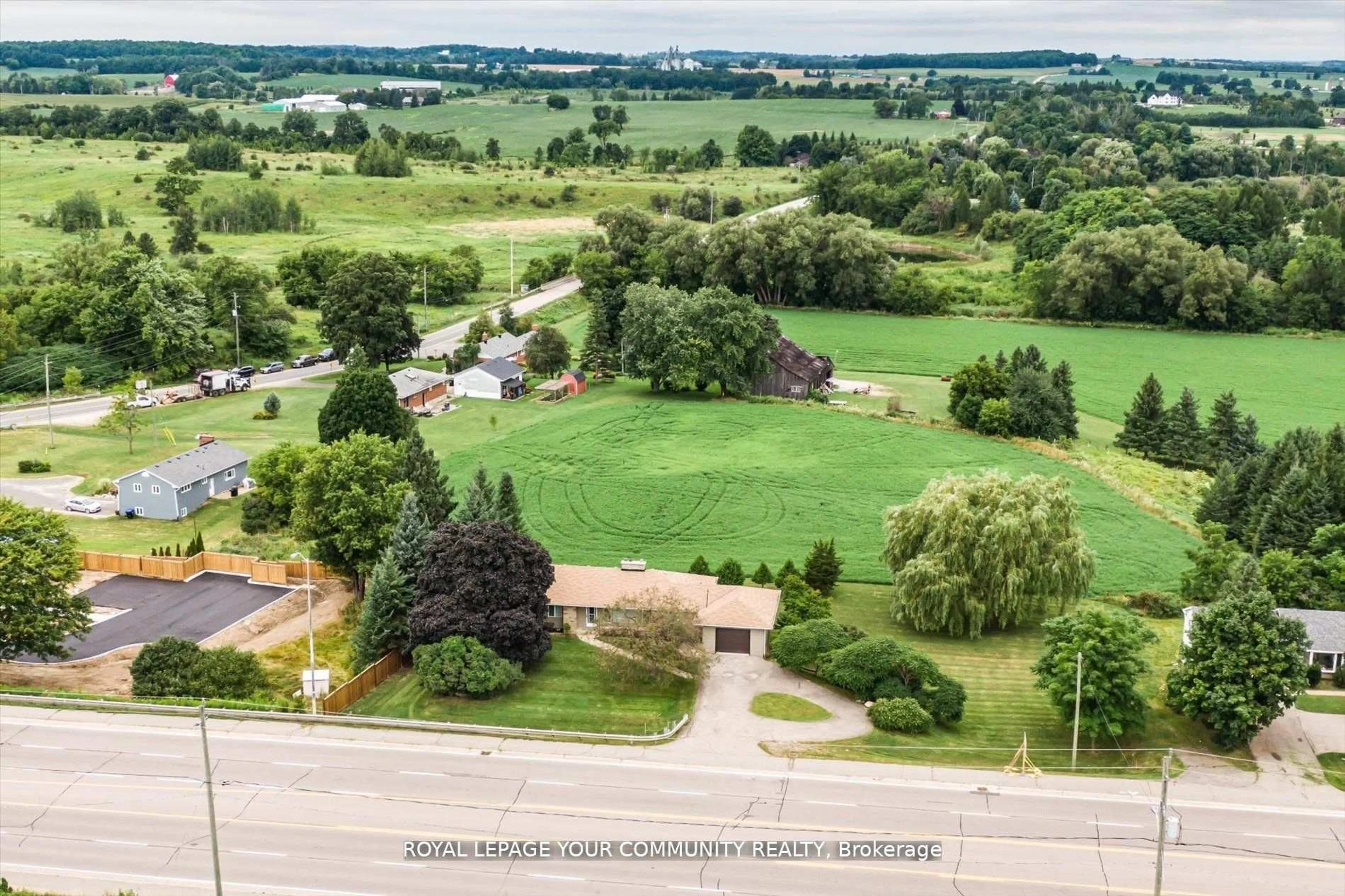A pic from outside/outdoor area/front of a property/back of a property/a pic from drone, mountain view for 6162 Highway 9, King Ontario L0G 1T0