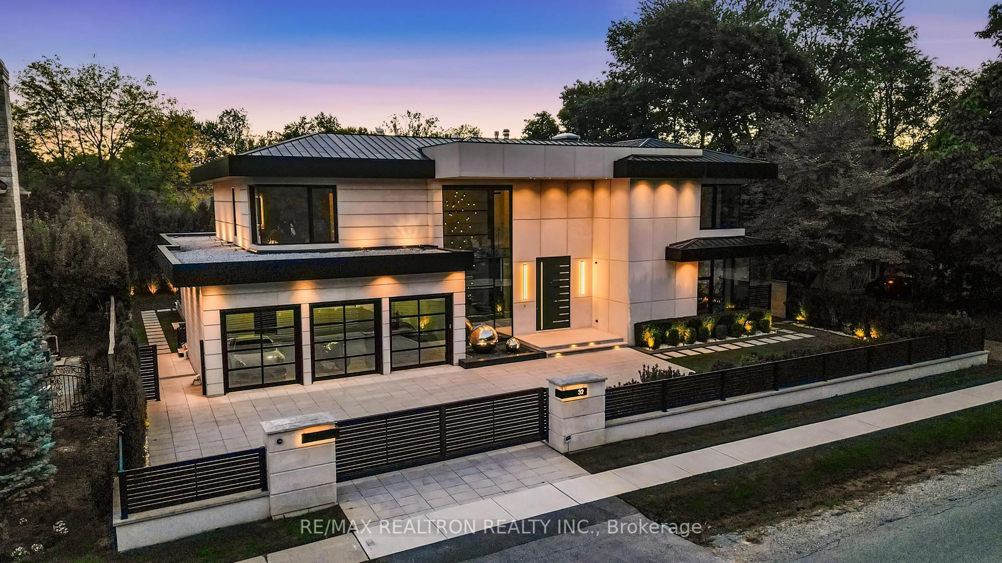 Home with brick exterior material, street for 32 Laureleaf Rd, Markham Ontario L3T 2X5
