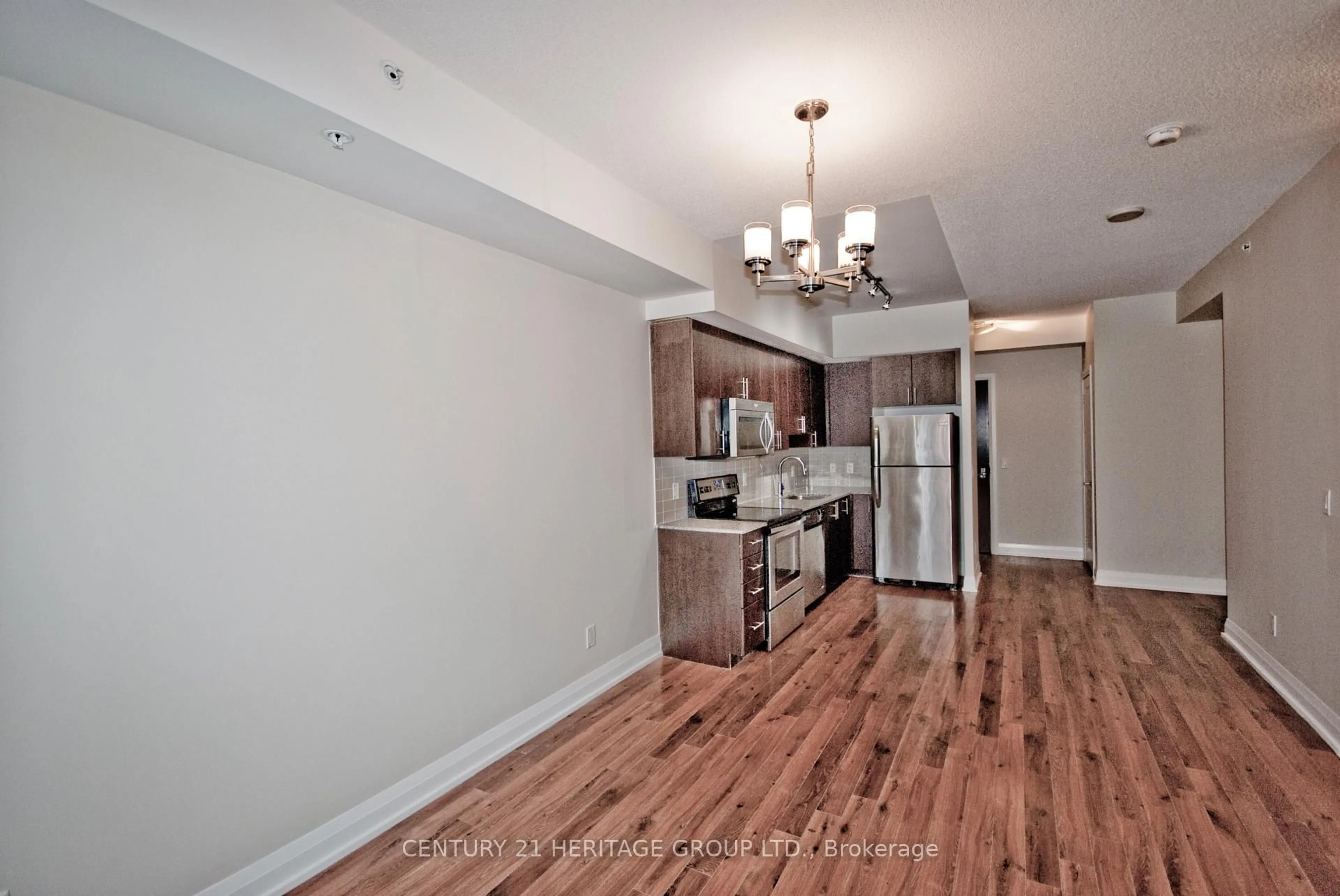 Open concept kitchen, wood/laminate floor for 85 North Park Rd #209, Vaughan Ontario L4J 0H9