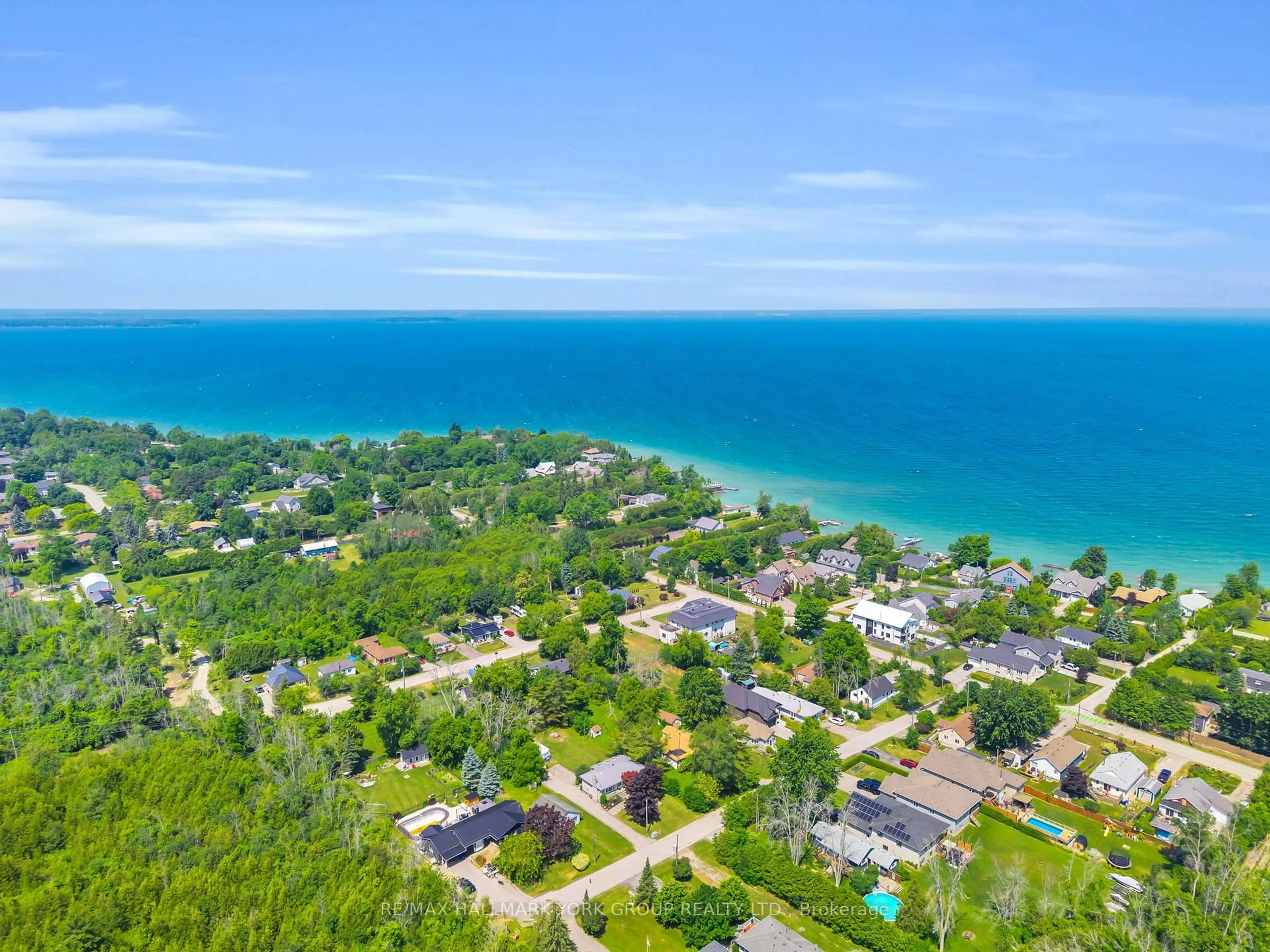 A pic from outside/outdoor area/front of a property/back of a property/a pic from drone, water/lake/river/ocean view for 8 Rushton Rd, Georgina Ontario L0E 1S0