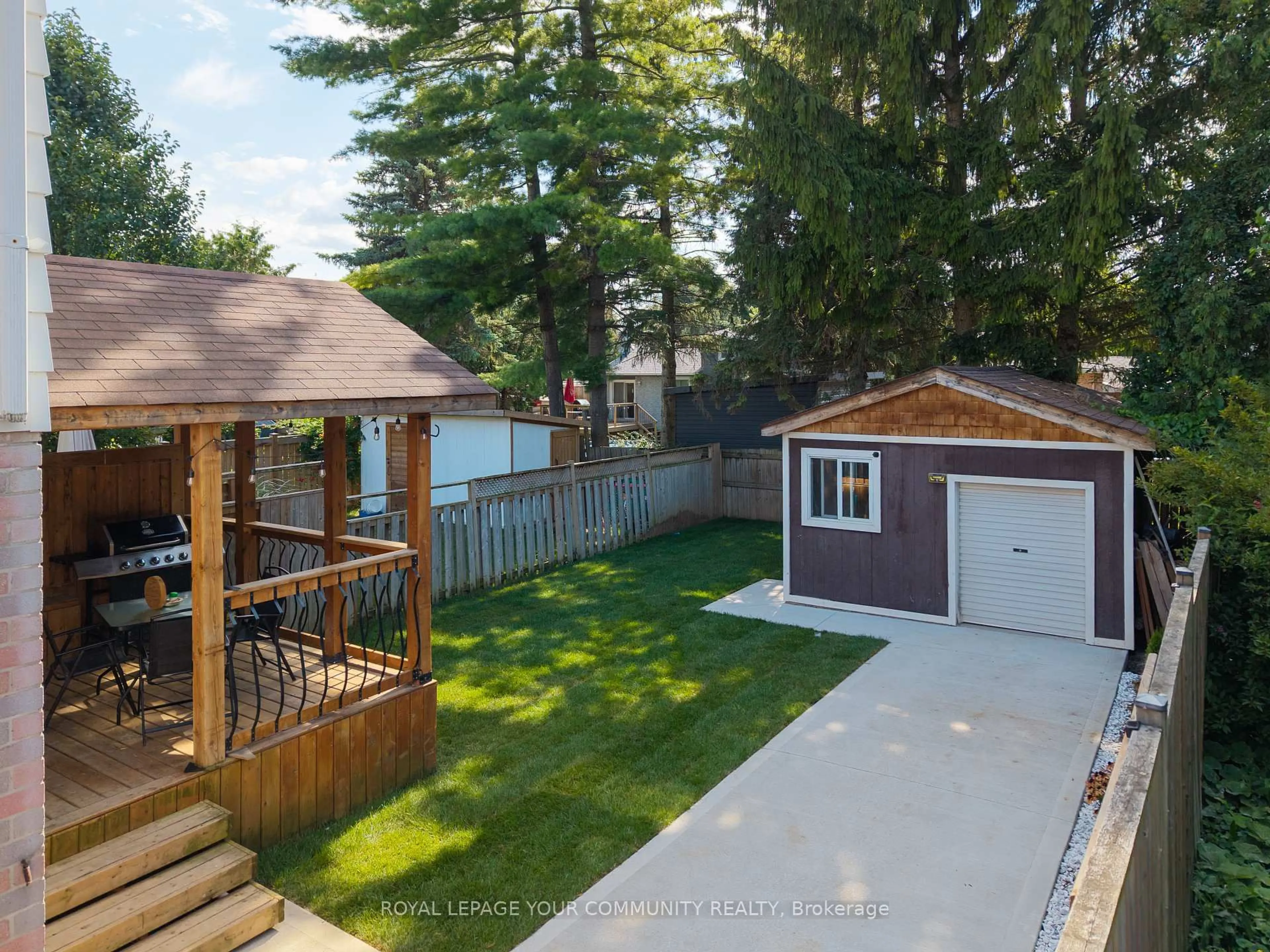 A pic from outside/outdoor area/front of a property/back of a property/a pic from drone, unknown for 50 Stewart Ave, New Tecumseth Ontario L9R 1C2