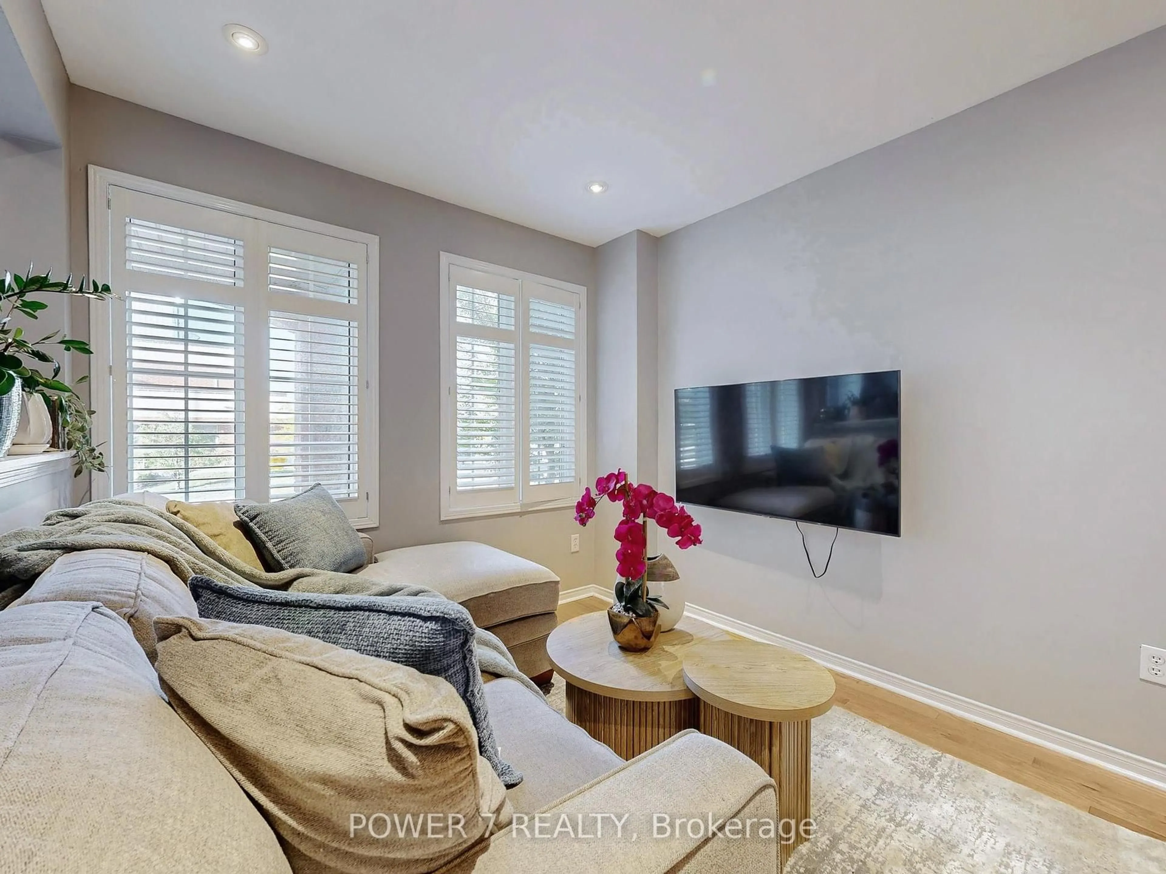 Living room with furniture, wood/laminate floor for 379 White's Hill Ave, Markham Ontario L6B 0J4
