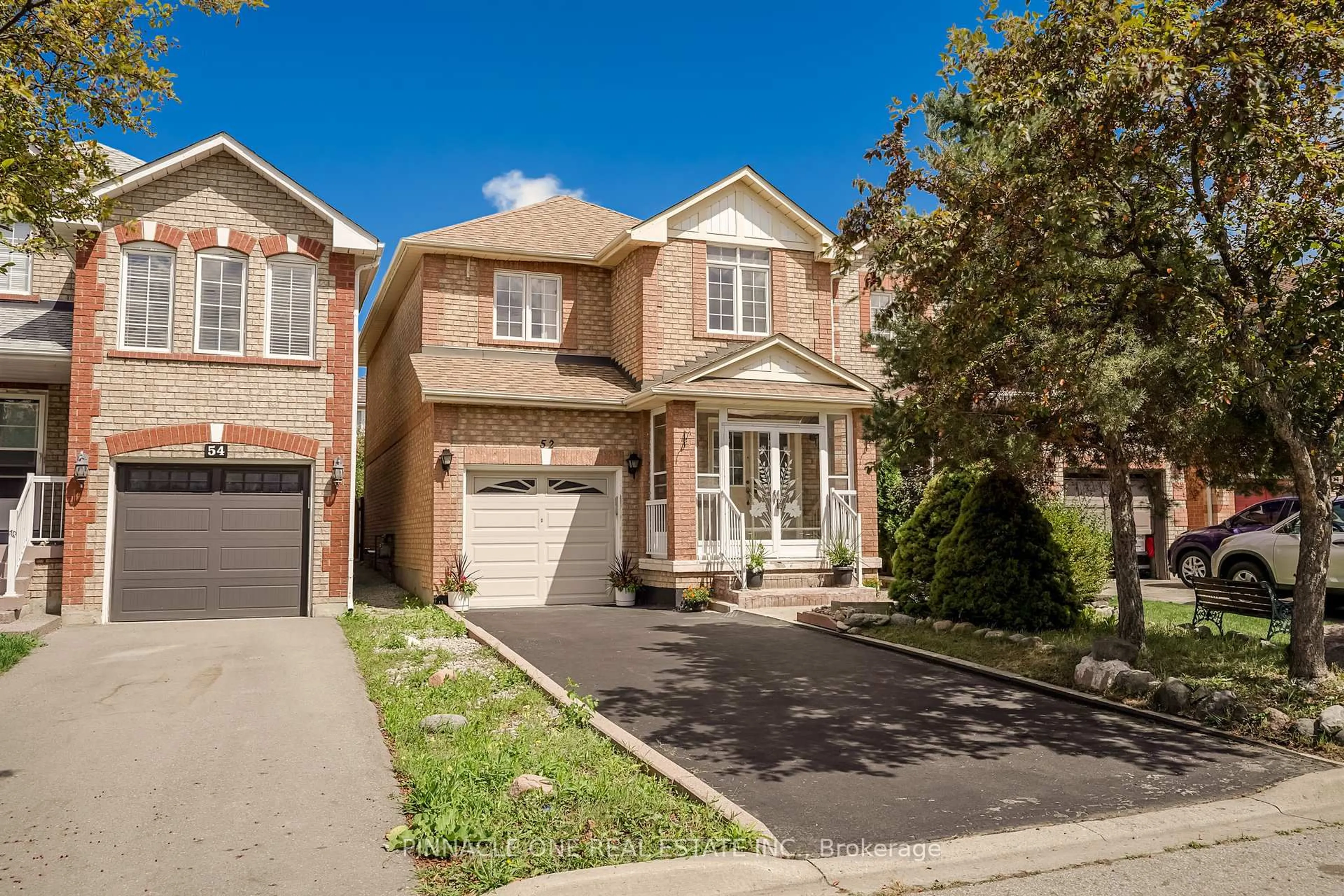 Home with brick exterior material, street for 52 Vogue St, Markham Ontario L3S 4G5