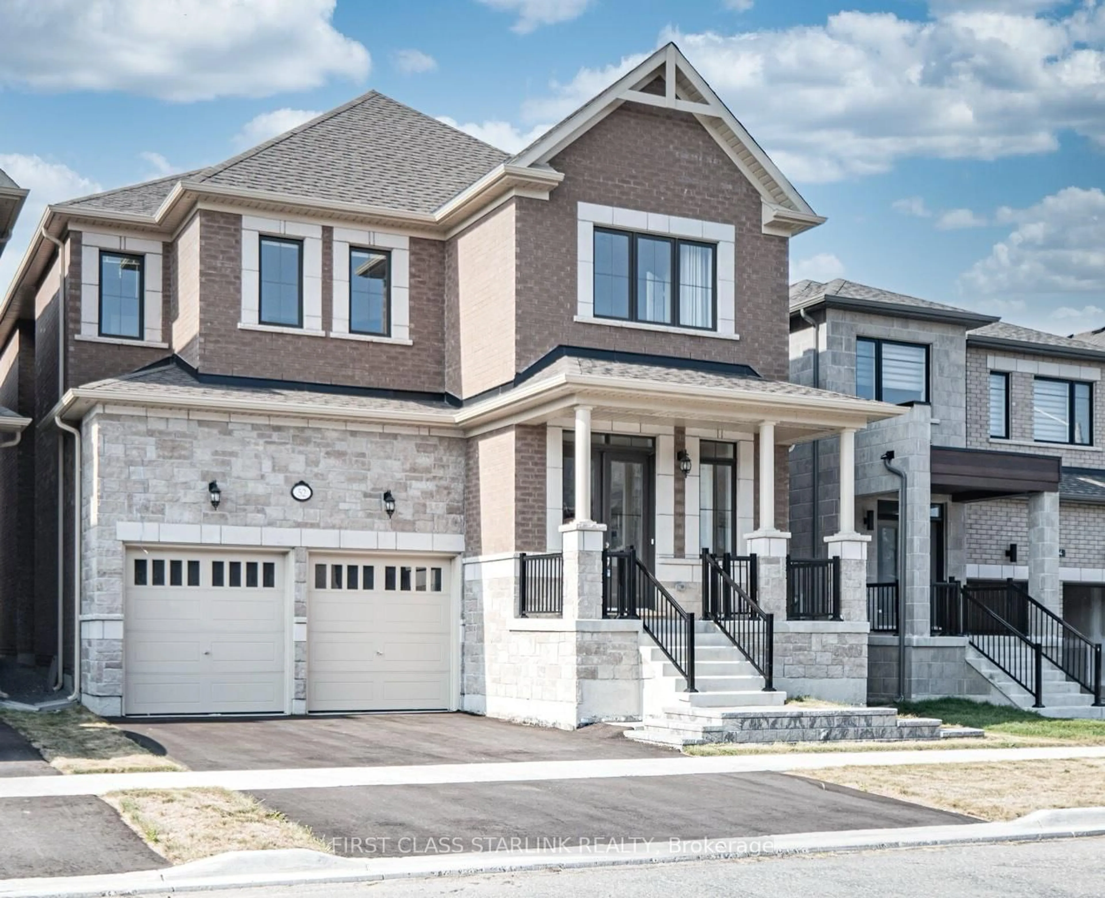 Home with brick exterior material, street for 52 Jinnah Ave, Markham Ontario L3S 0G2