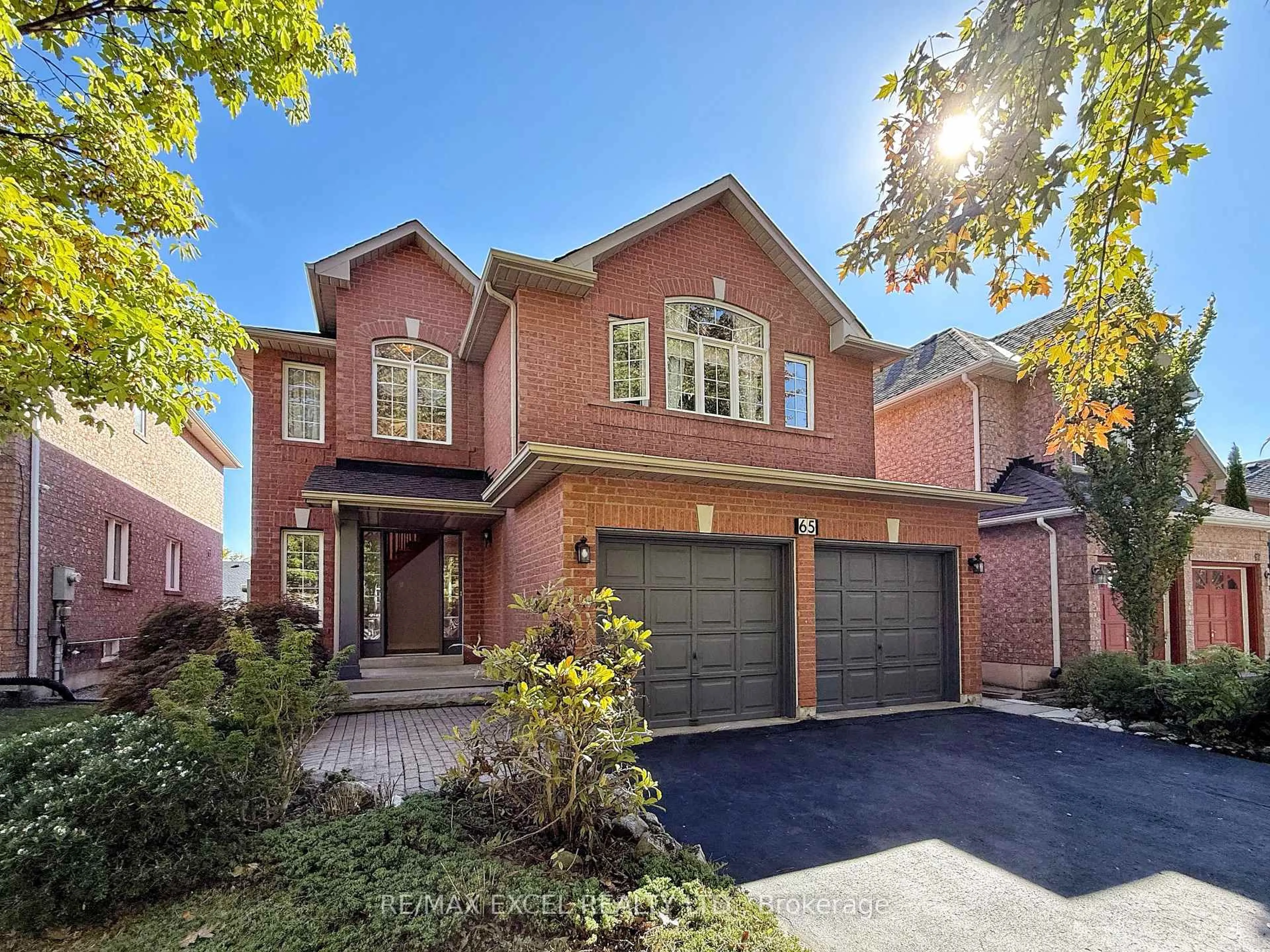 Home with brick exterior material, street for 65 Falling River Dr, Richmond Hill Ontario L4S 2R3
