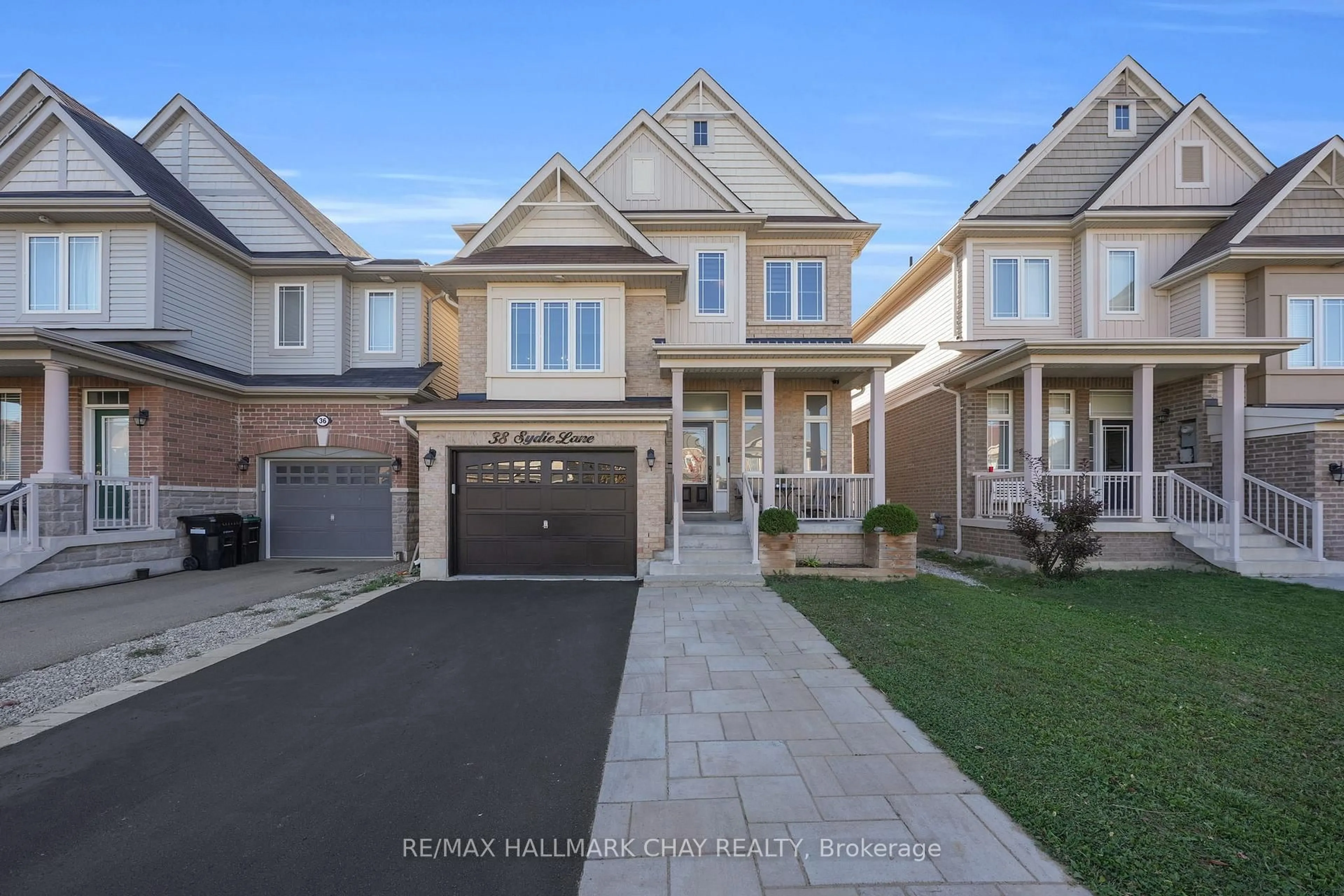 Home with brick exterior material, street for 38 Sydie Lane, New Tecumseth Ontario L0G 1W0