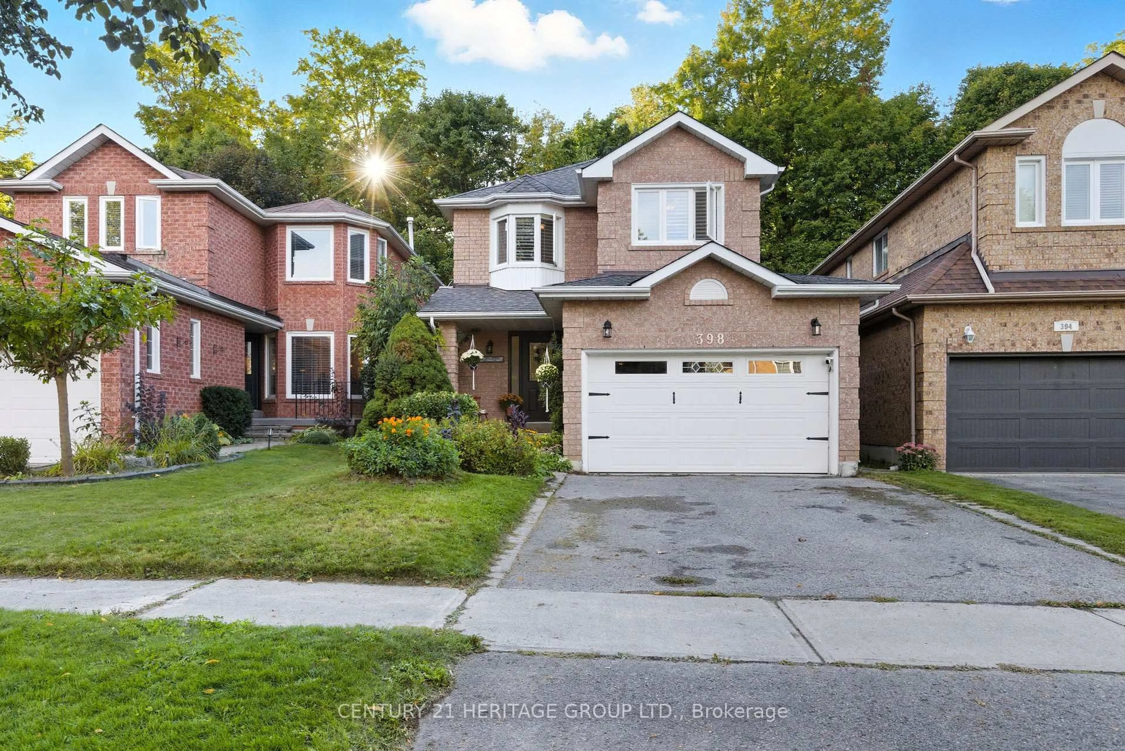 Home with brick exterior material, street for 398 Carruthers Ave, Newmarket Ontario L3X 2C1
