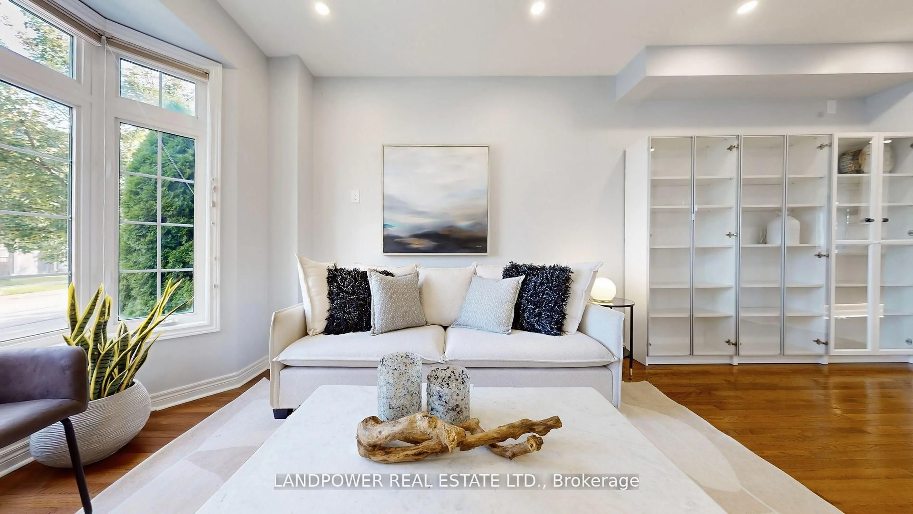 Living room with furniture, wood/laminate floor for 6 Pyneside St, Markham Ontario L6B 0R6