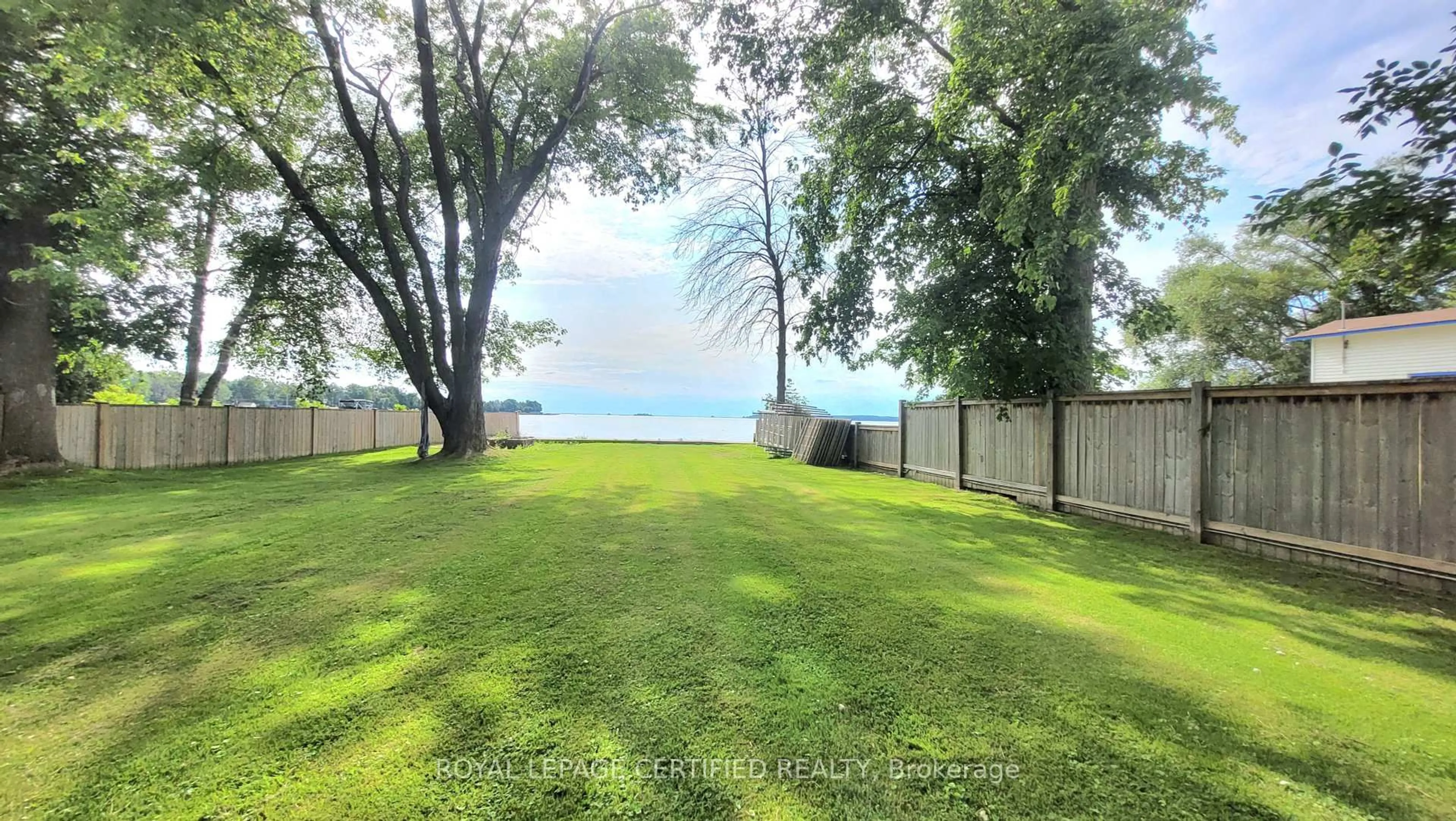A pic from outside/outdoor area/front of a property/back of a property/a pic from drone, water/lake/river/ocean view for 598 Duclos Point Rd, Georgina Ontario L0E 1N0