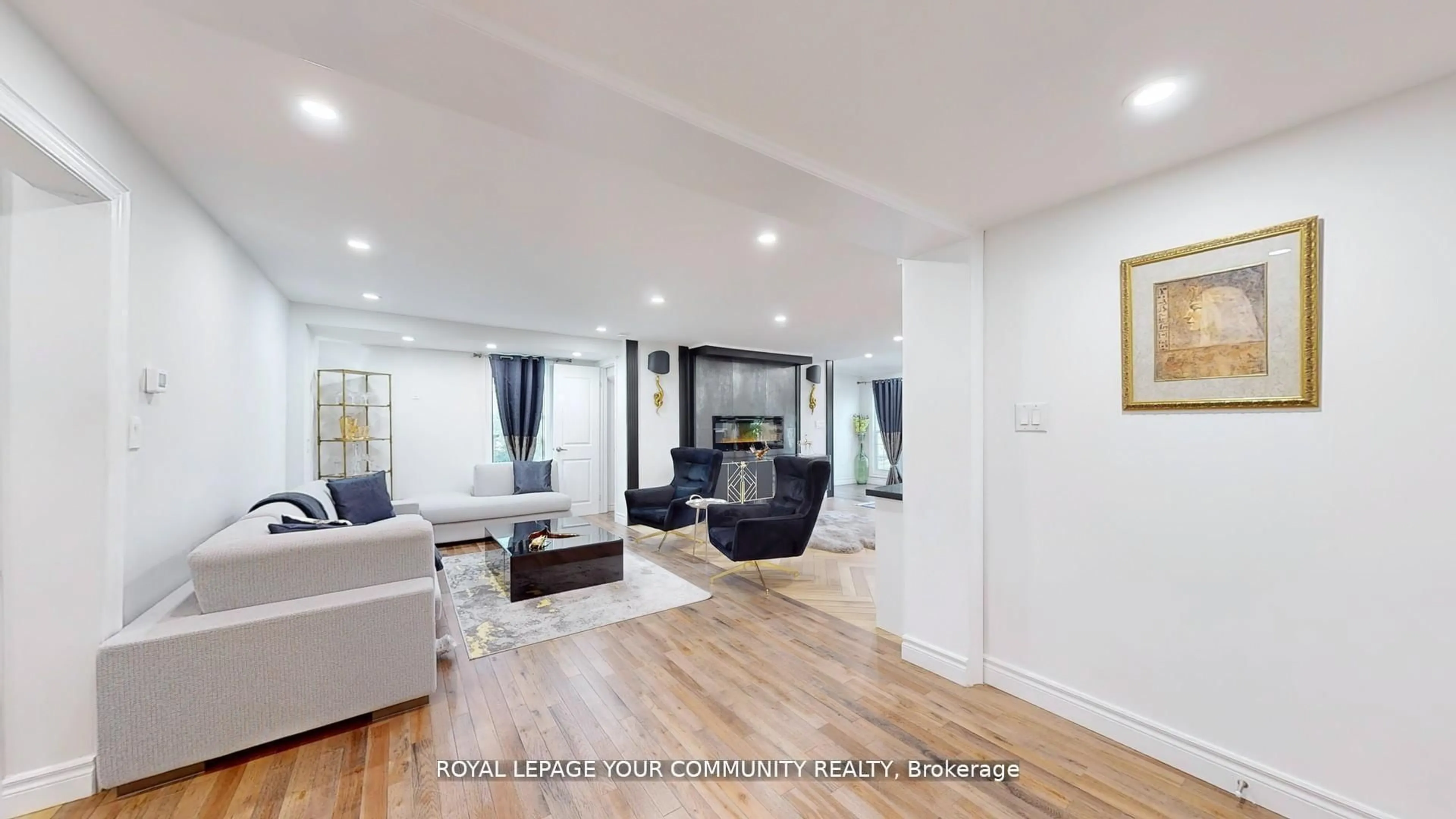 Living room with furniture, wood/laminate floor for 64 Machell Ave, Aurora Ontario L4G 2R7
