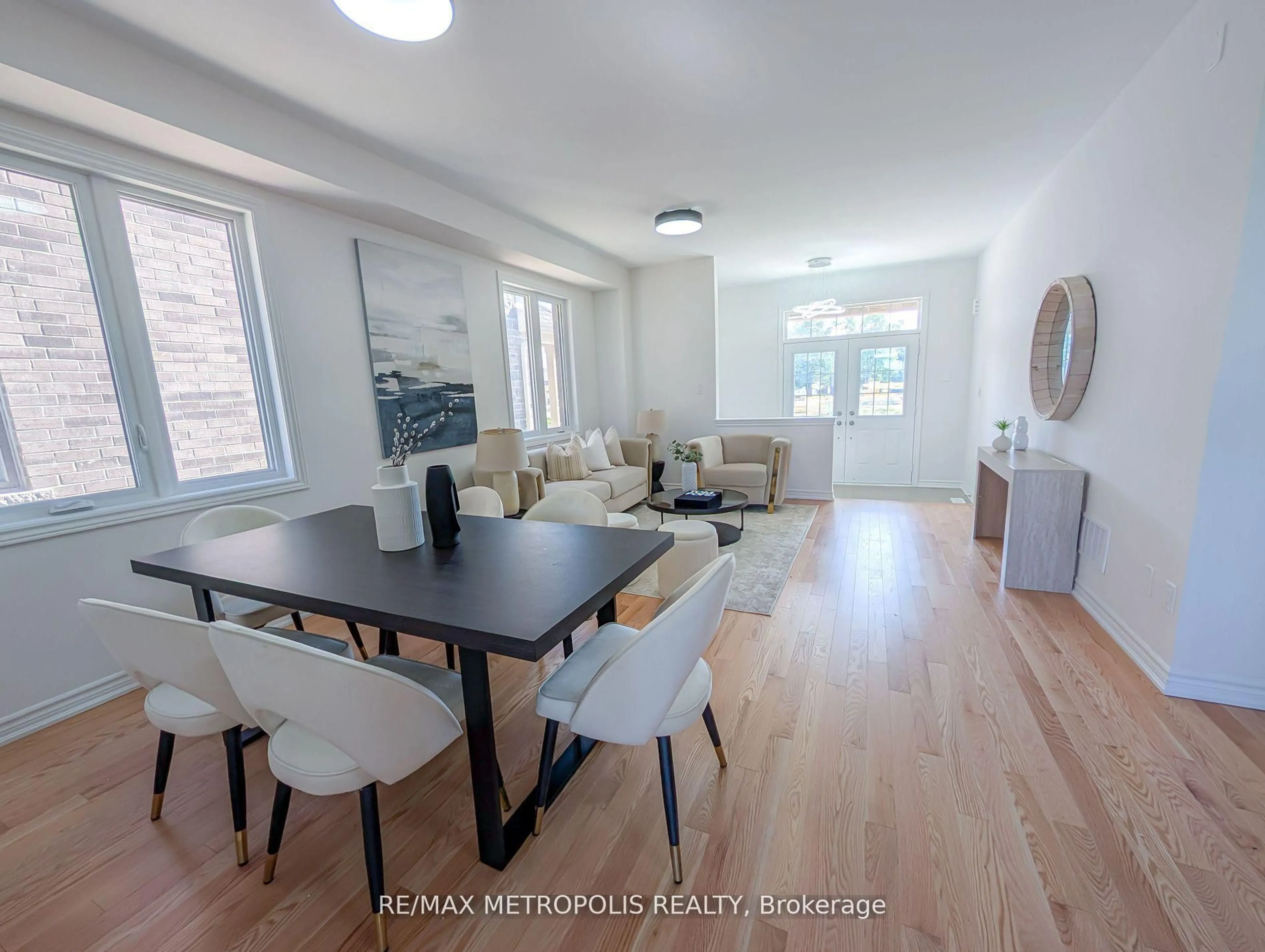 Living room with furniture, wood/laminate floor for 67 BRETHET Hts, New Tecumseth Ontario L0G 1A0
