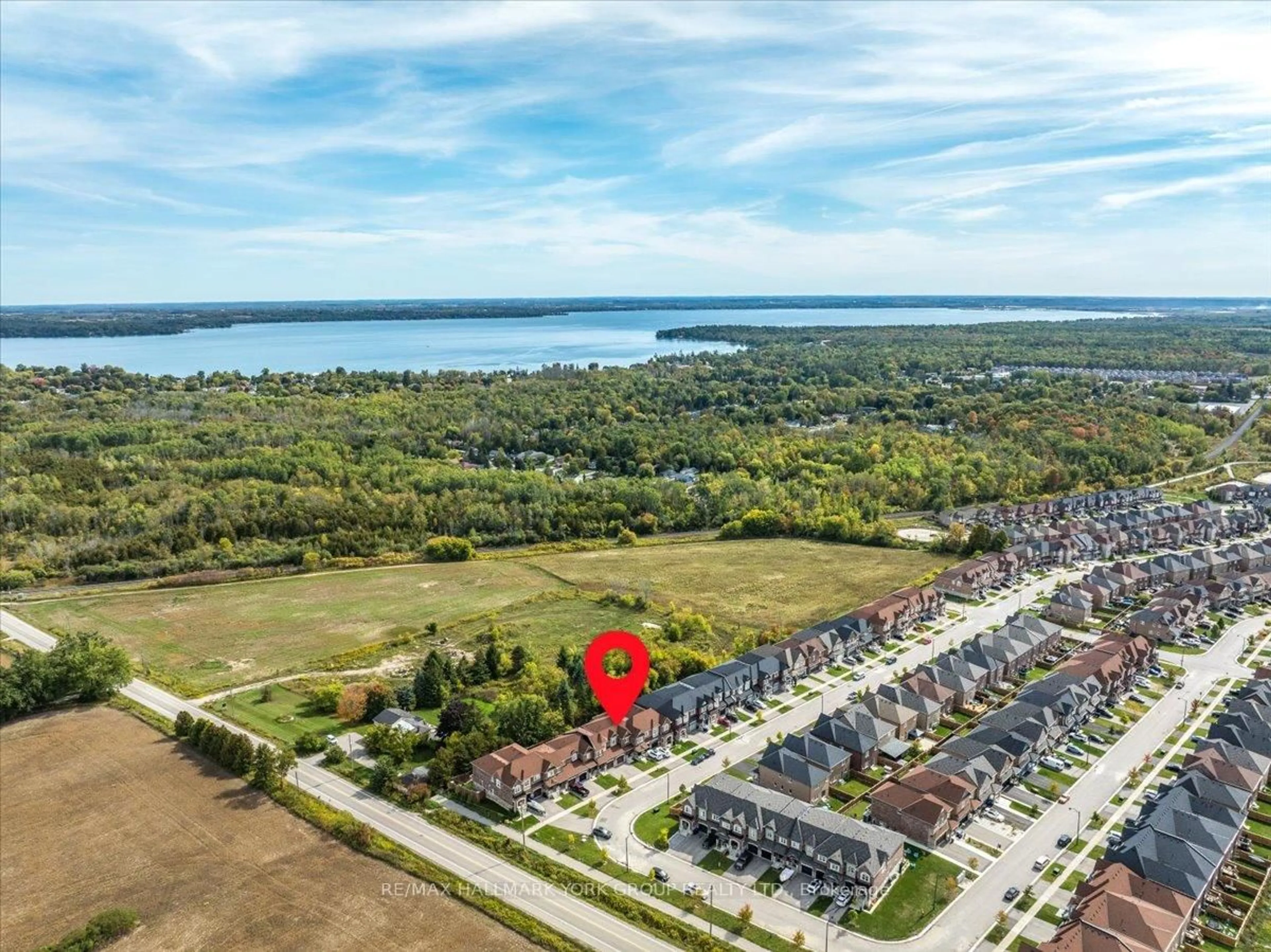 A pic from outside/outdoor area/front of a property/back of a property/a pic from drone, water/lake/river/ocean view for 1192 Peelar Cres, Innisfil Ontario L0L 1W0