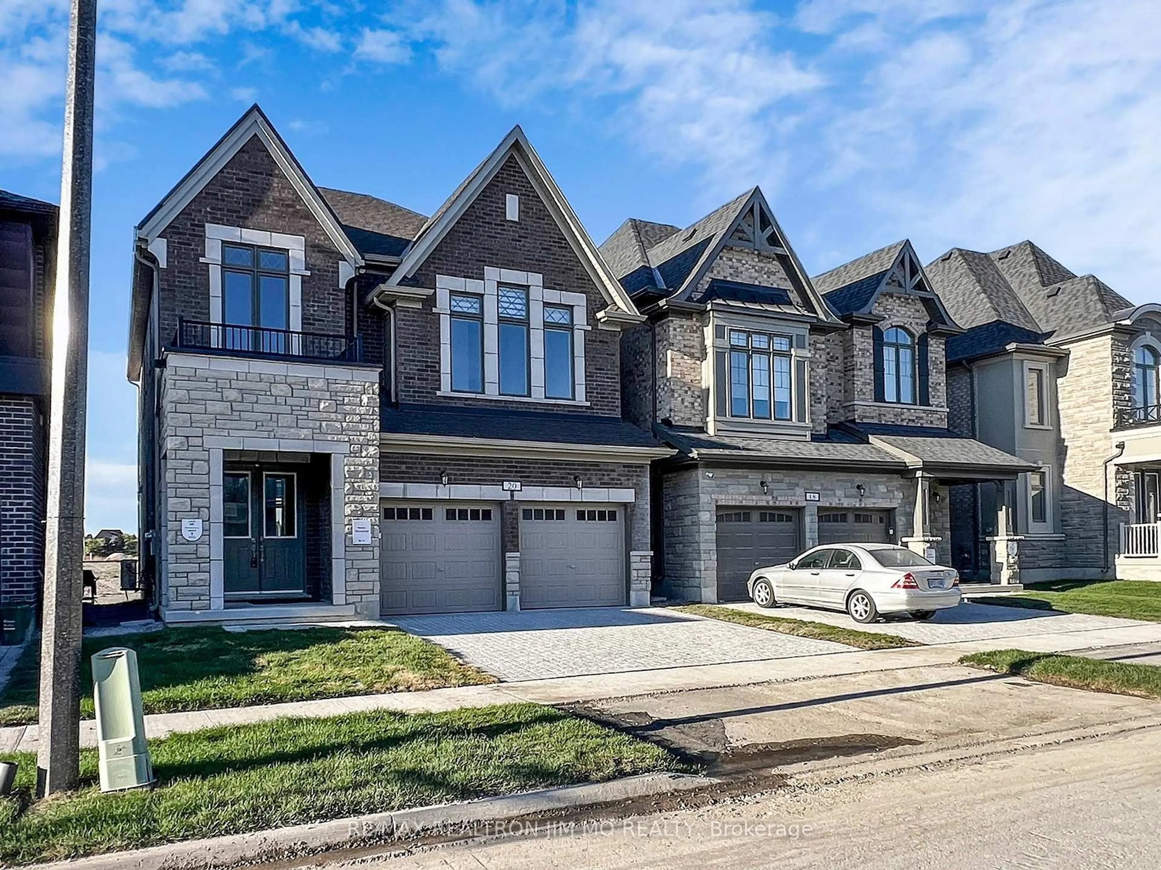 Home with brick exterior material, street for 20 Nanhai Ave, Markham Ontario L6C 3M9
