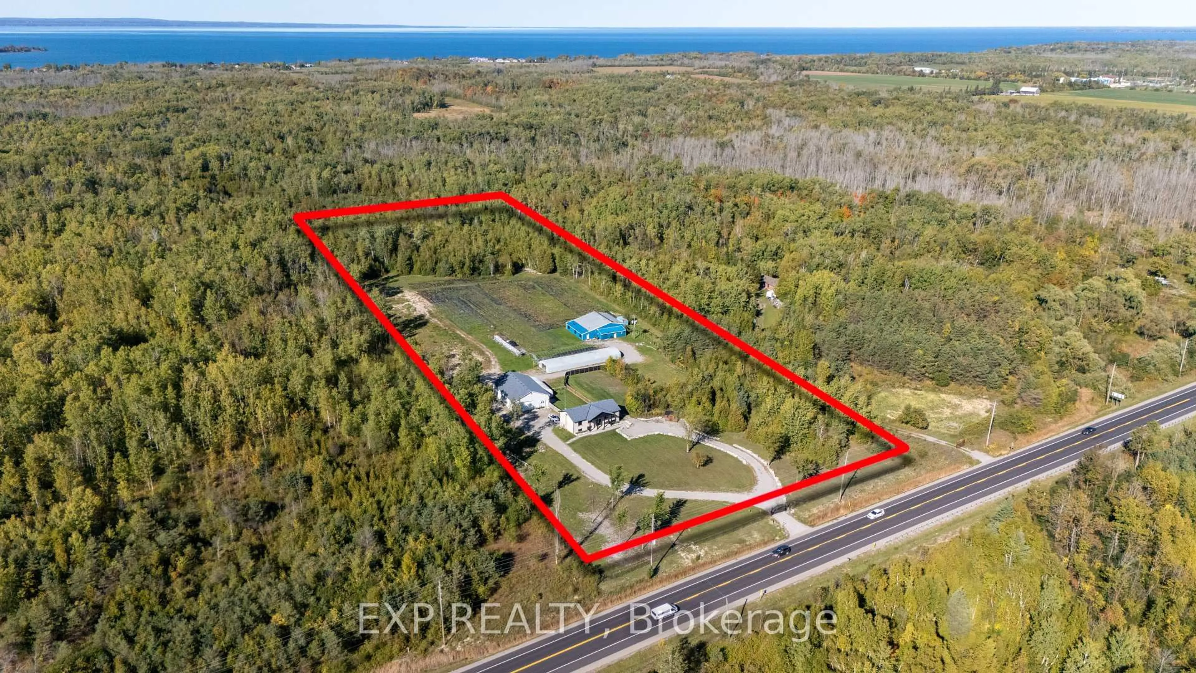 A pic from outside/outdoor area/front of a property/back of a property/a pic from drone, water/lake/river/ocean view for 2388 Baseline Rd, Georgina Ontario L4P 3E9