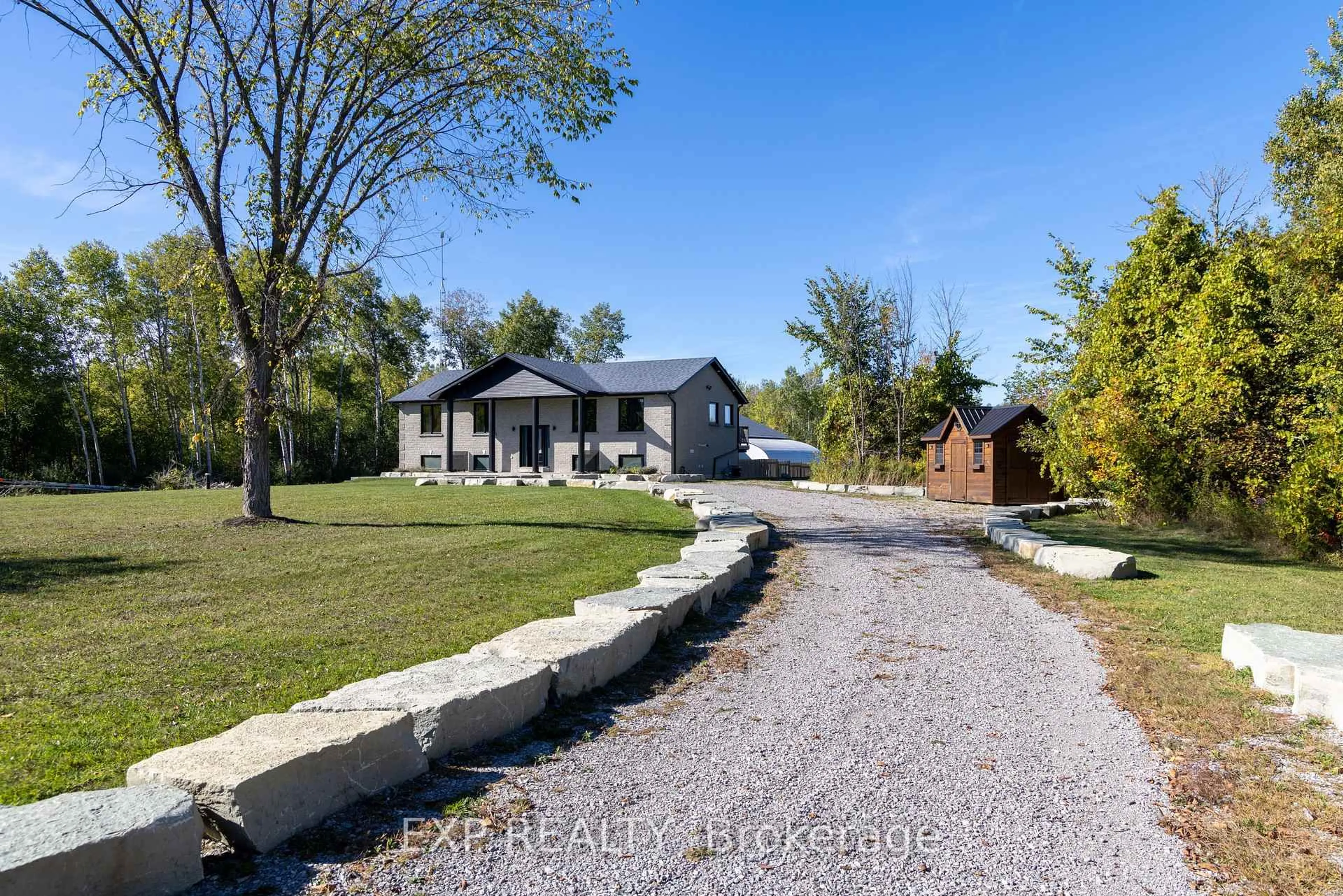 A pic from outside/outdoor area/front of a property/back of a property/a pic from drone, street for 2388 Baseline Rd, Georgina Ontario L4P 3E9