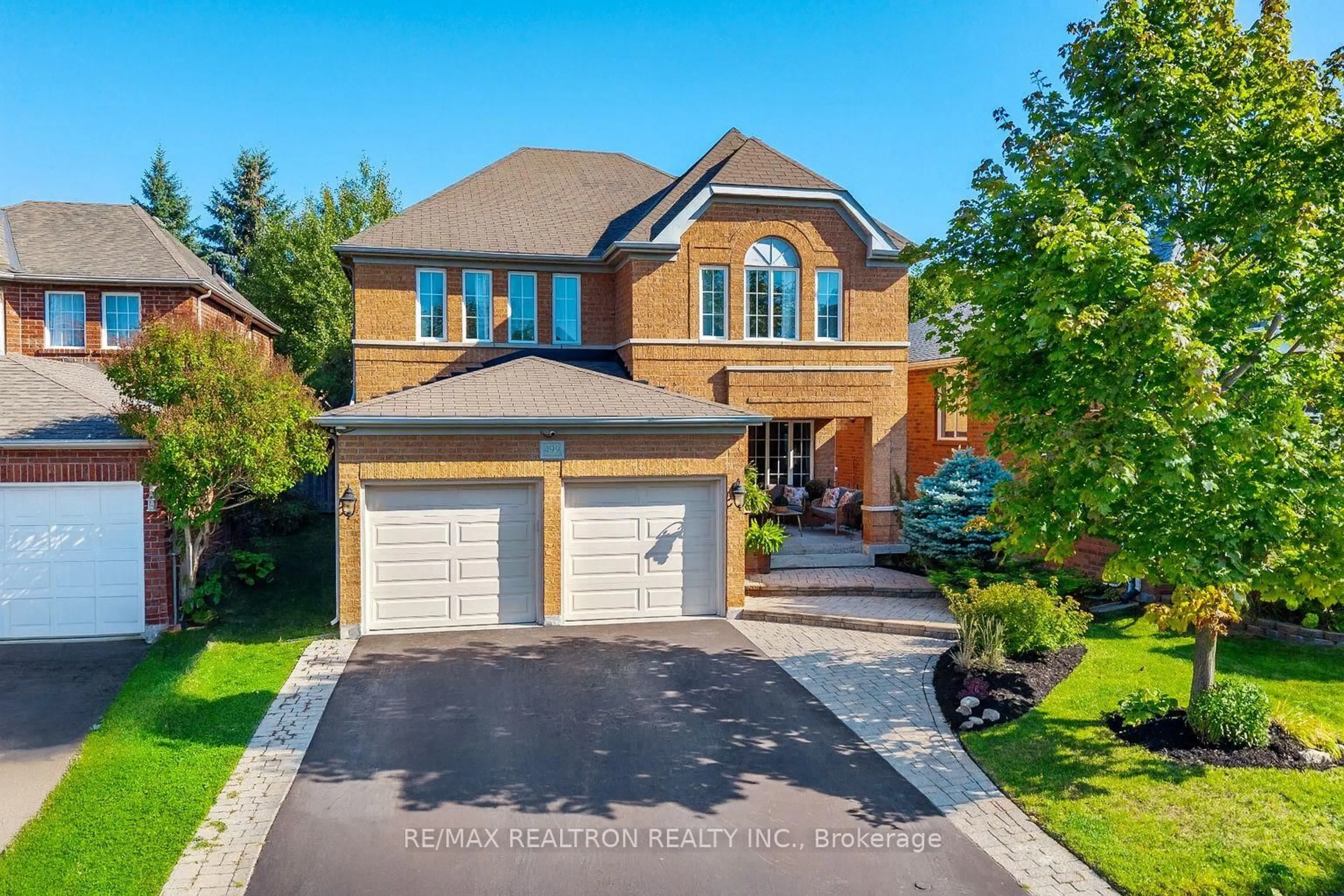 Home with brick exterior material, street for 499 Silken Laumann Dr, Newmarket Ontario L3X 2H9