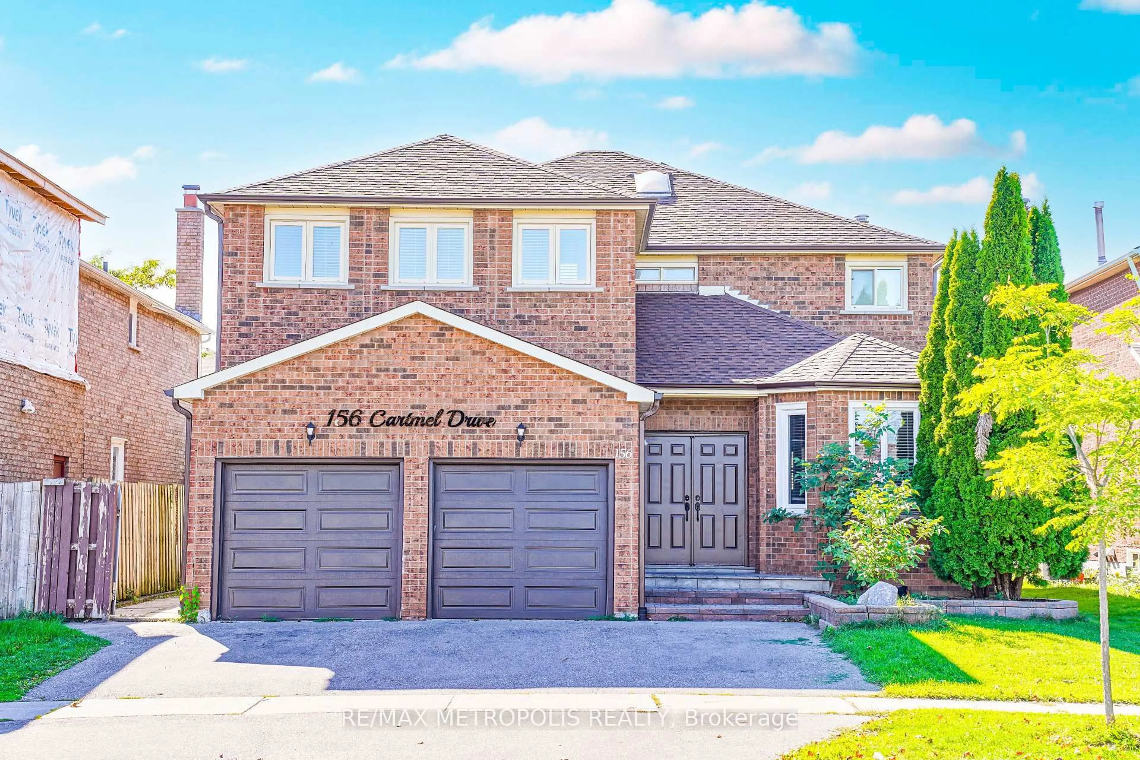 Home with brick exterior material, street for 156 Cartmel Dr, Markham Ontario L3S 1W3