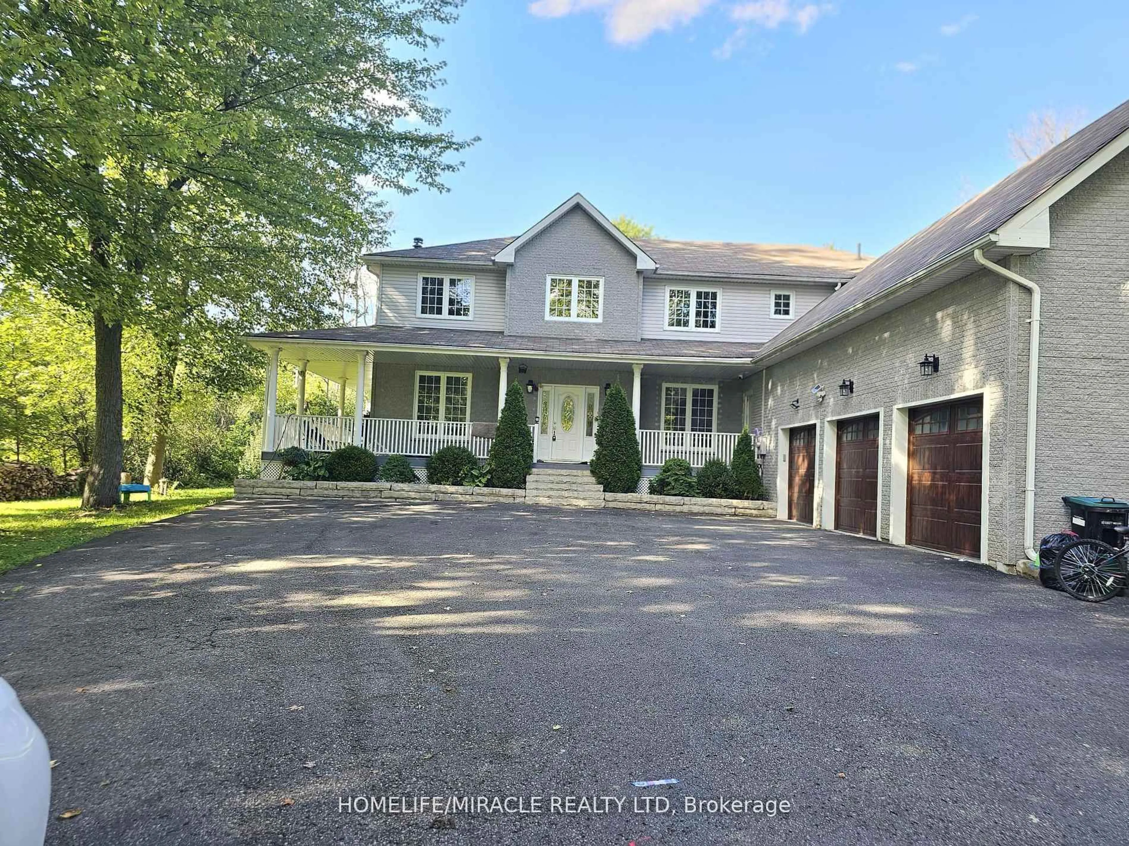 A pic from outside/outdoor area/front of a property/back of a property/a pic from drone, street for 7268 9th Line, New Tecumseth Ontario L0G 1A0