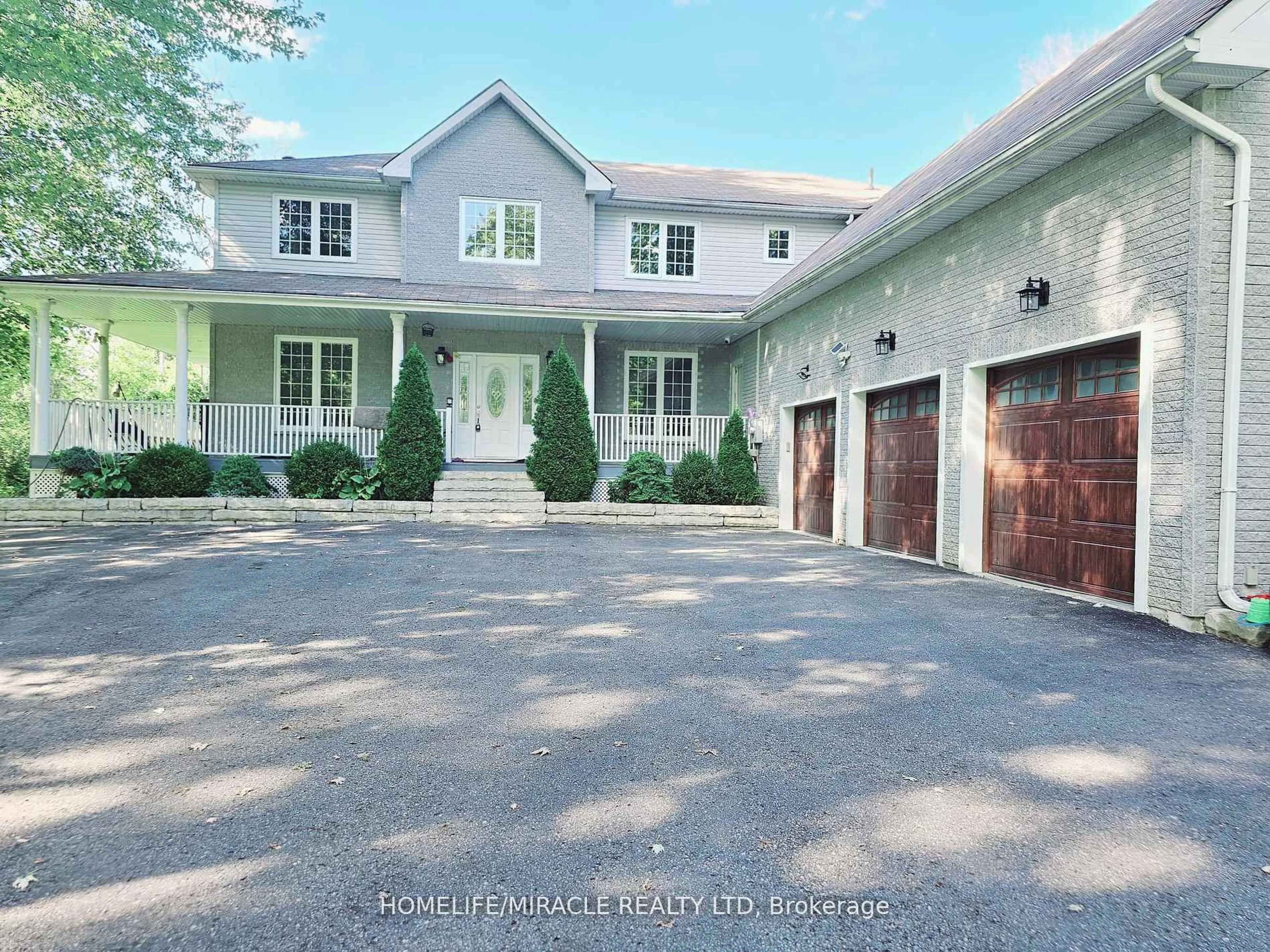 A pic from outside/outdoor area/front of a property/back of a property/a pic from drone, street for 7268 9th Line, New Tecumseth Ontario L0G 1A0