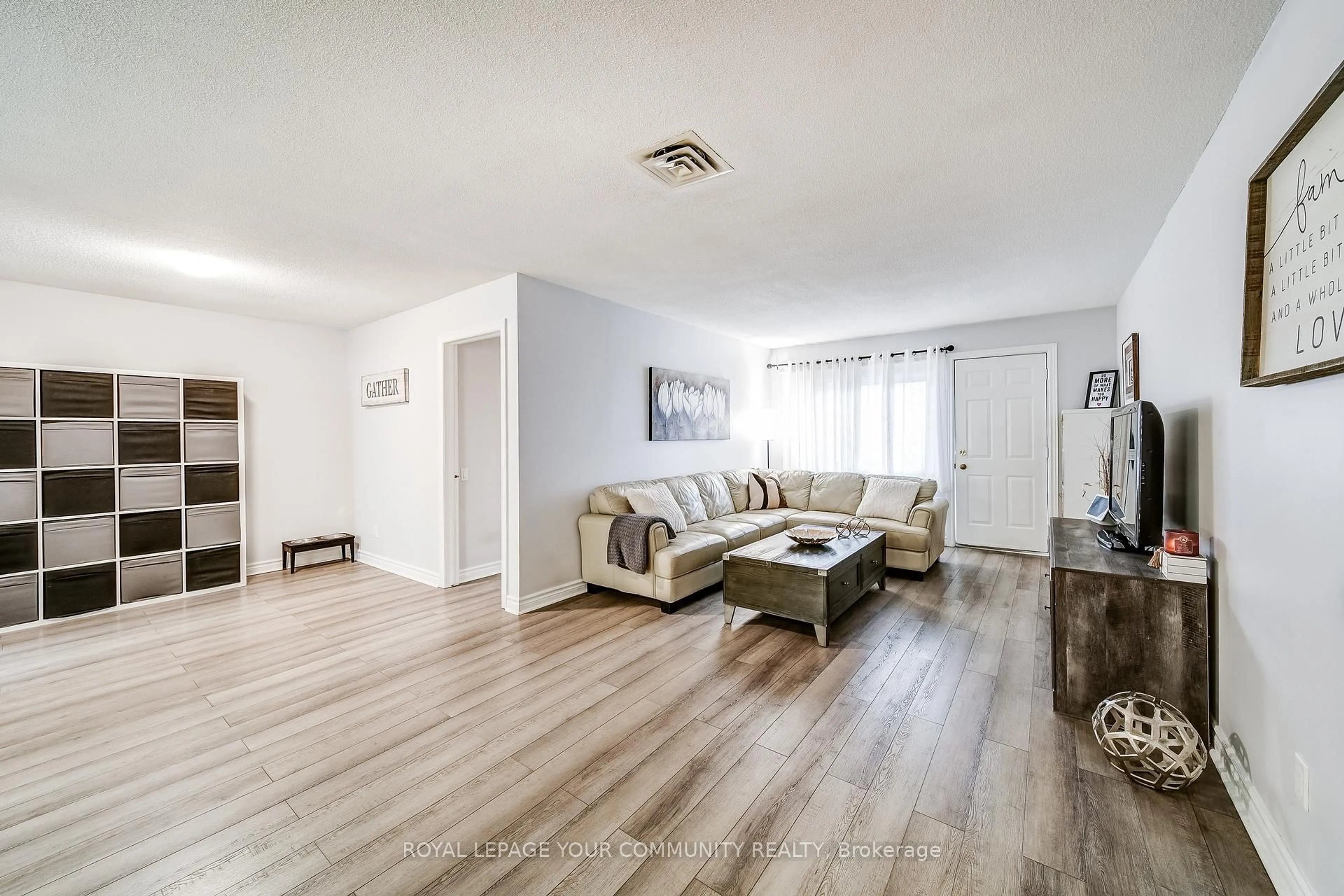 Living room with furniture, unknown for 77 Mill St #3, New Tecumseth Ontario L0G 1W0
