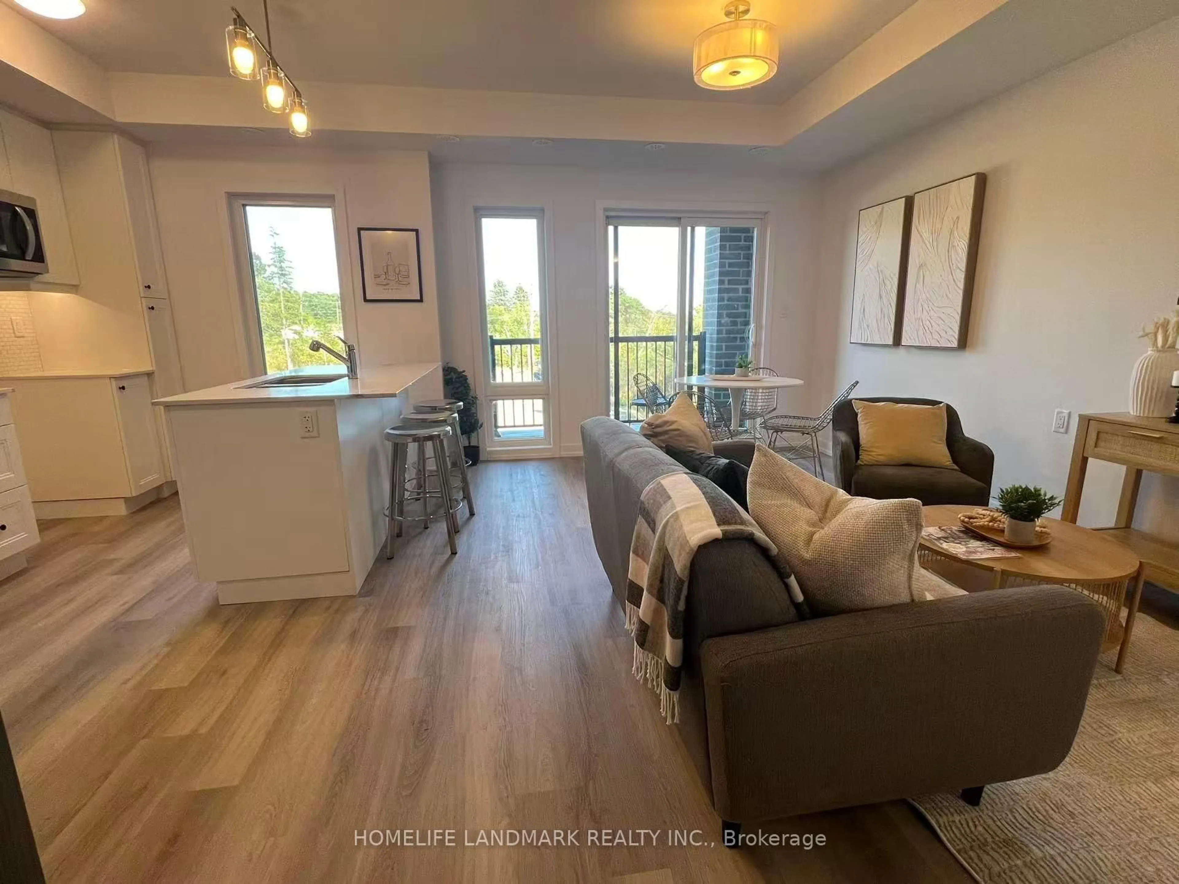 Living room with furniture, wood/laminate floor for 3 Bancroft Lane #212, Richmond Hill Ontario L4E 1M1