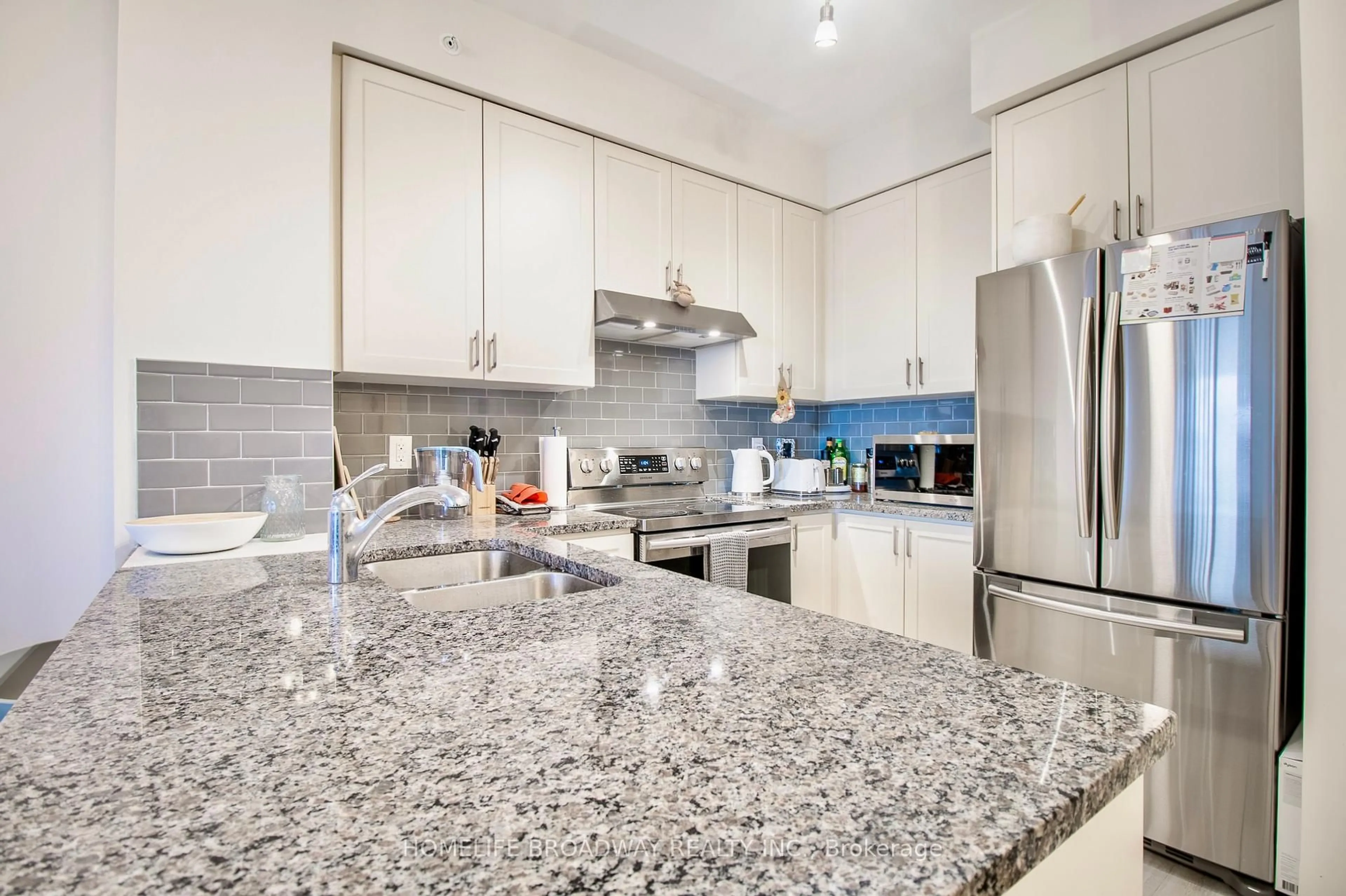 Contemporary kitchen, ceramic/tile floor for 9255 Jane St #815, Vaughan Ontario L6A 0K1