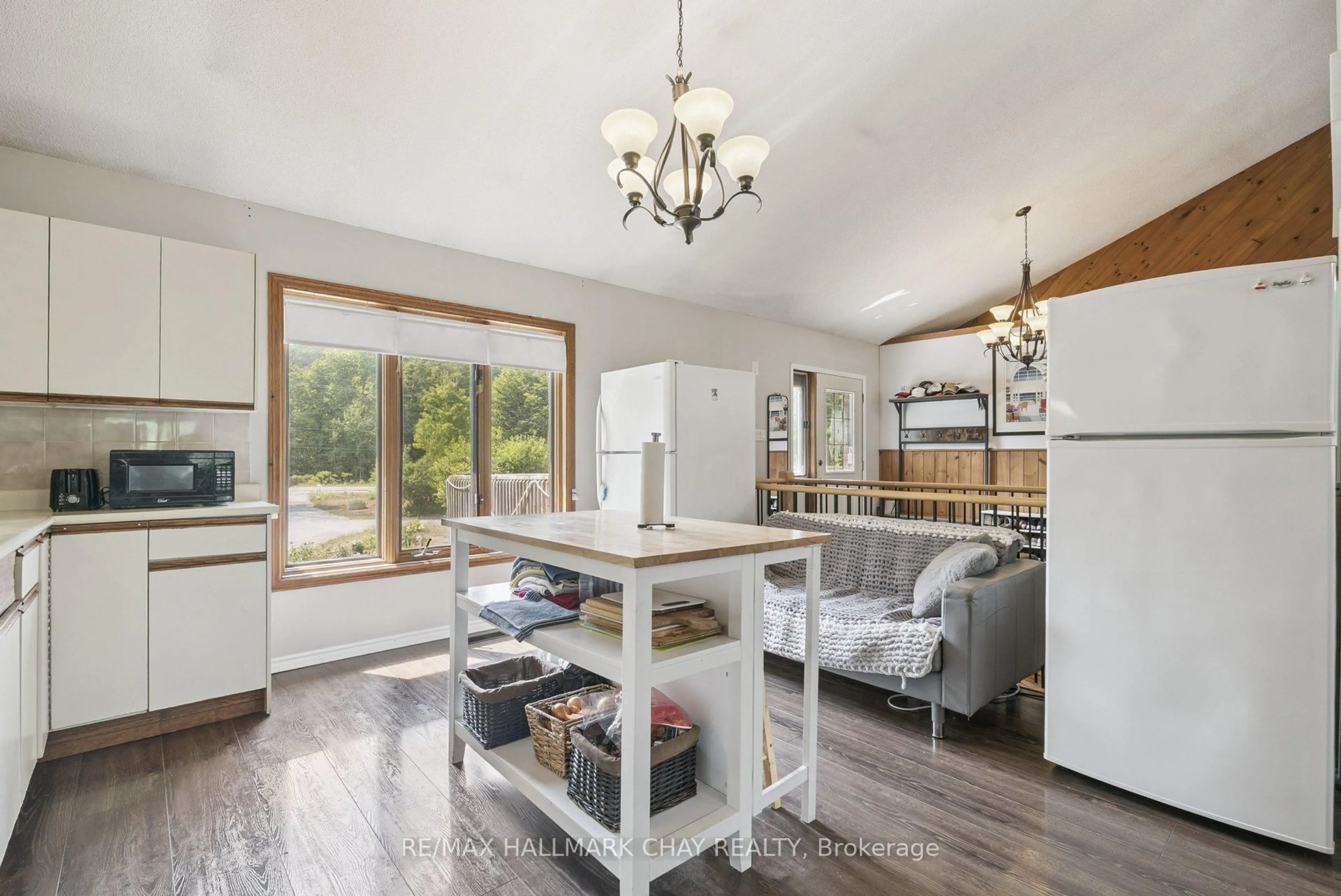 Open concept kitchen, wood/laminate floor for 7521 County Road 10, Essa Ontario L0M 1B1