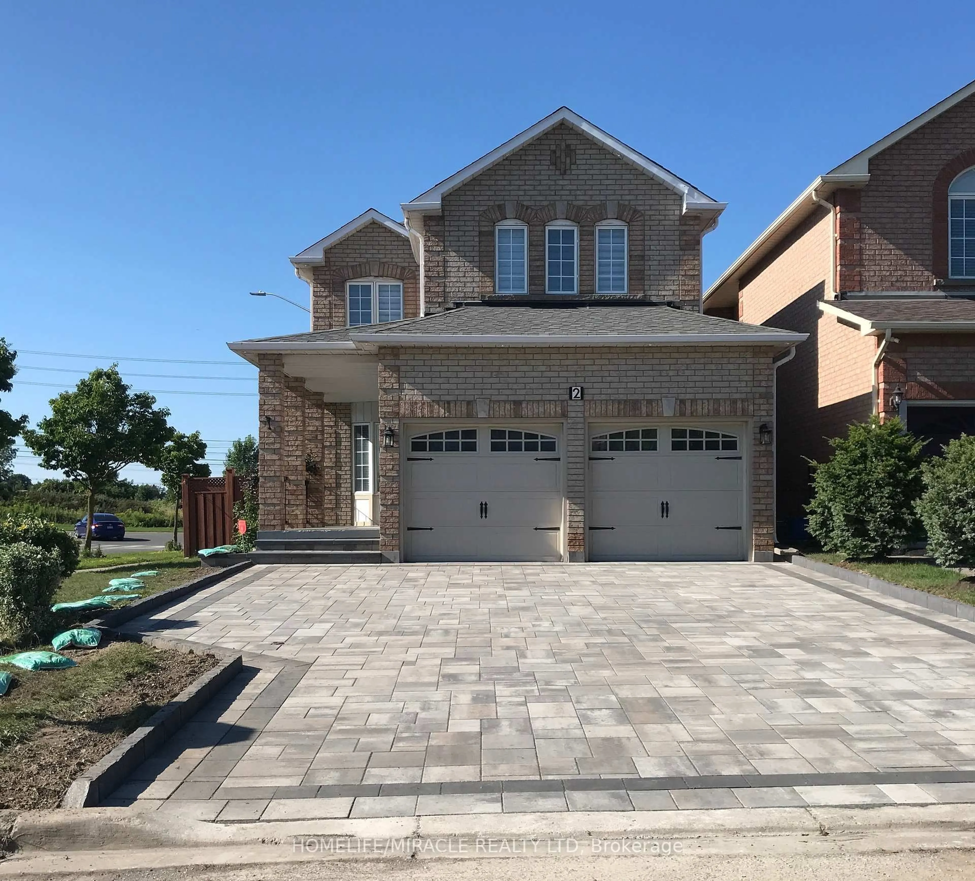 Home with brick exterior material, street for 2 Nessie St, Markham Ontario L3S 4J1