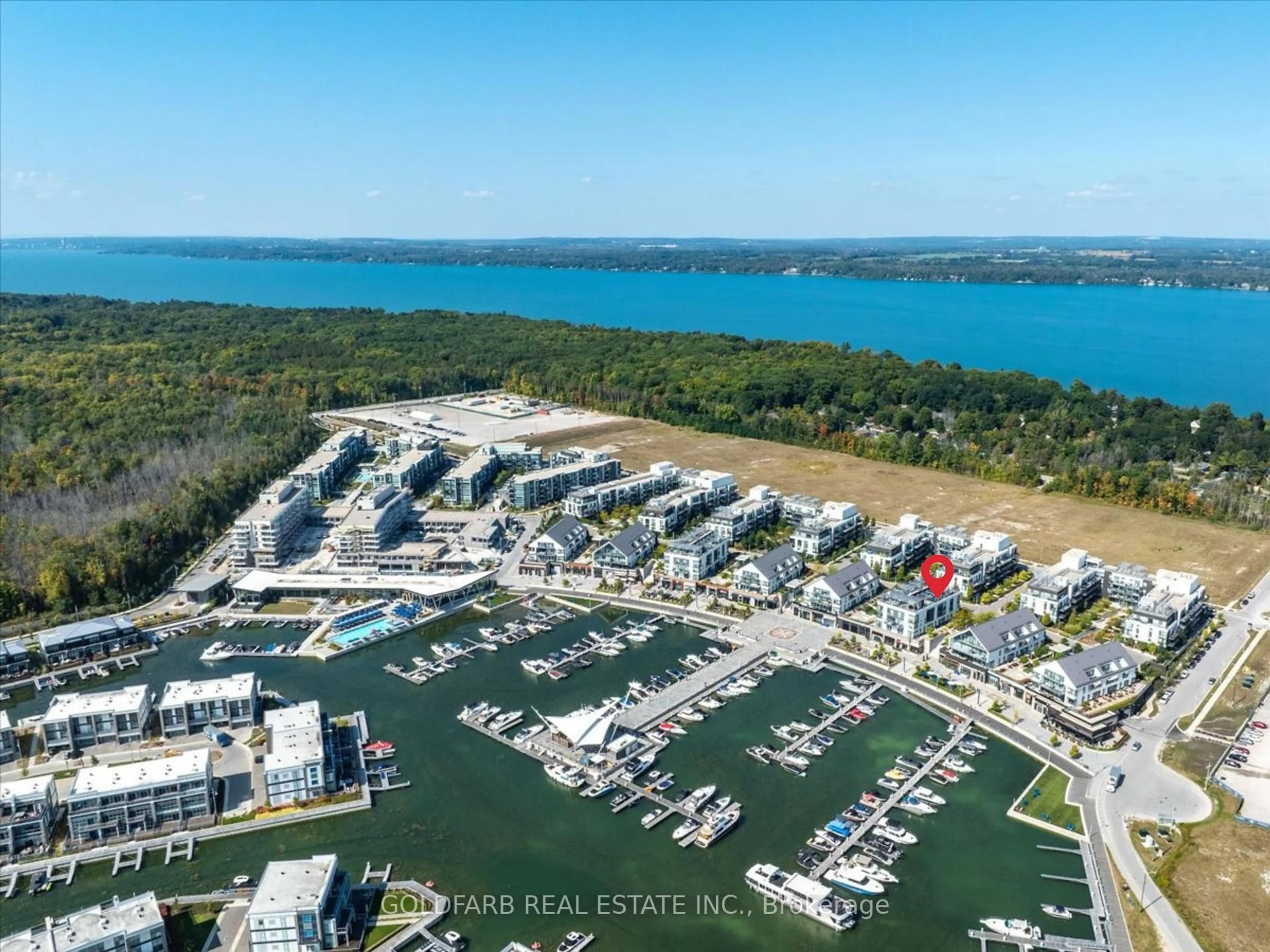 A pic from outside/outdoor area/front of a property/back of a property/a pic from drone, water/lake/river/ocean view for 261 Broward Way #42, Innisfil Ontario L9S 0J5
