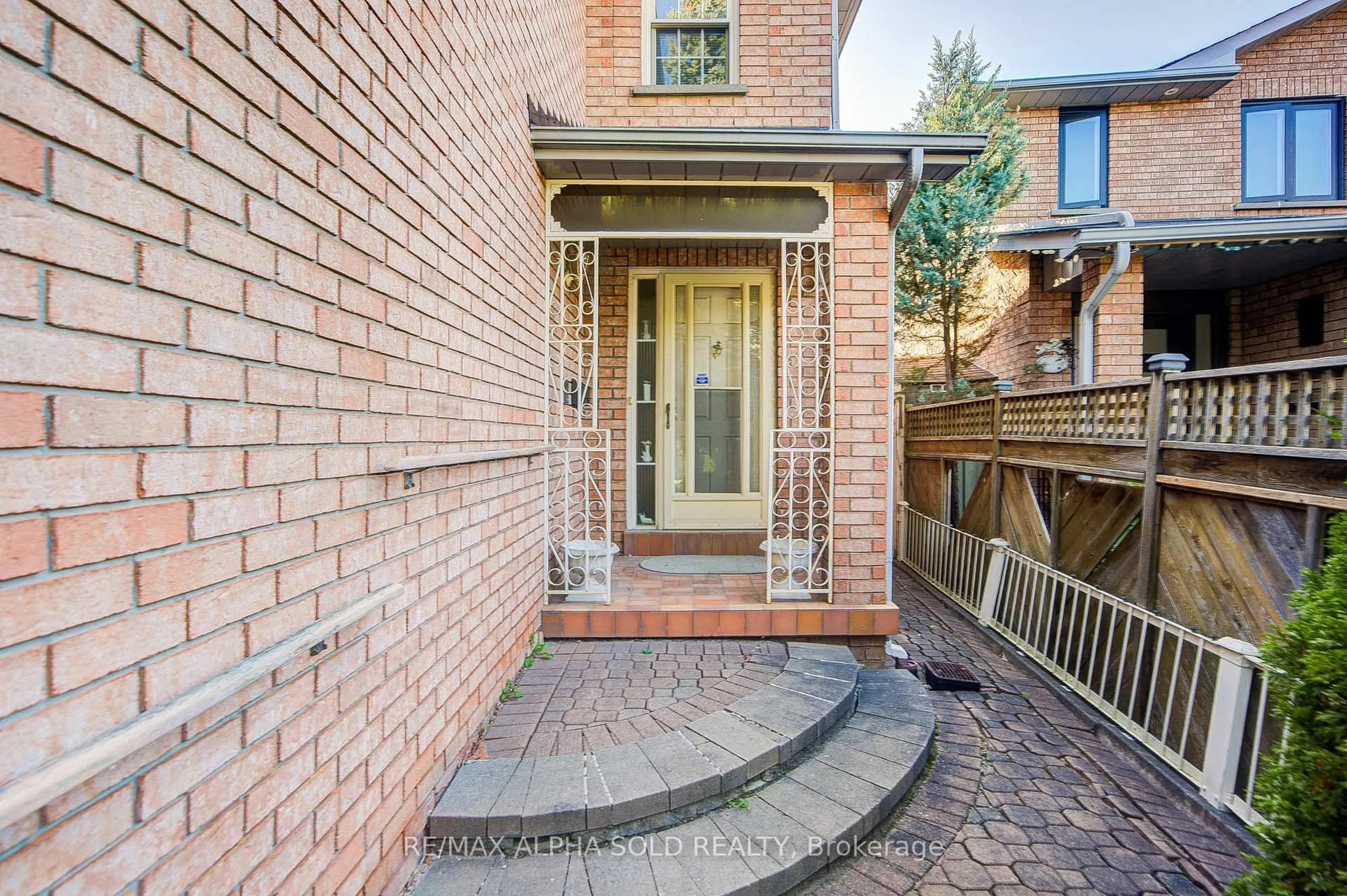 Home with brick exterior material, street for 82 Olivewood Dr, Markham Ontario L3S 3E2