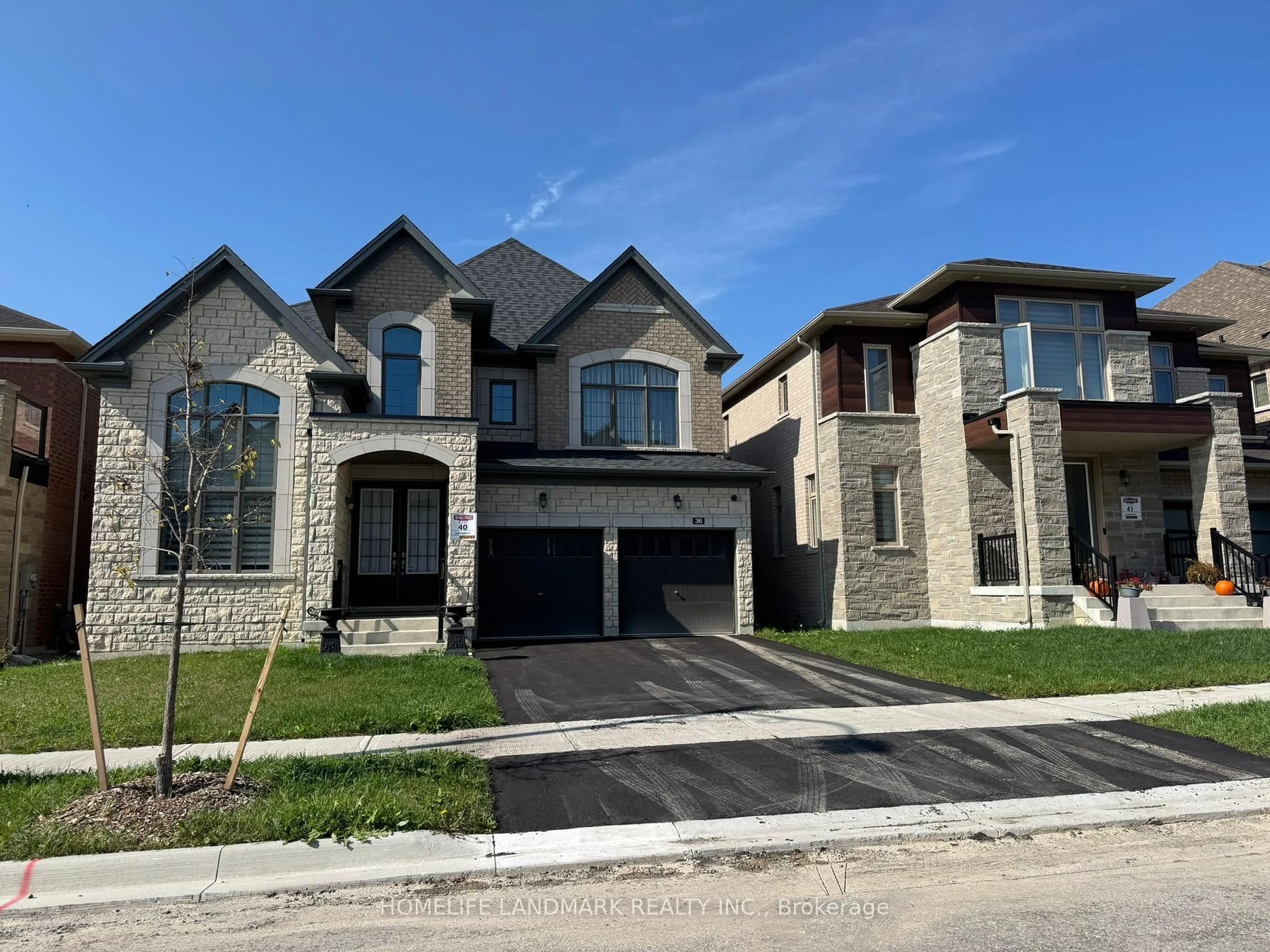 Home with brick exterior material, street for 36 Upbound Crt, East Gwillimbury Ontario L9N 0W5
