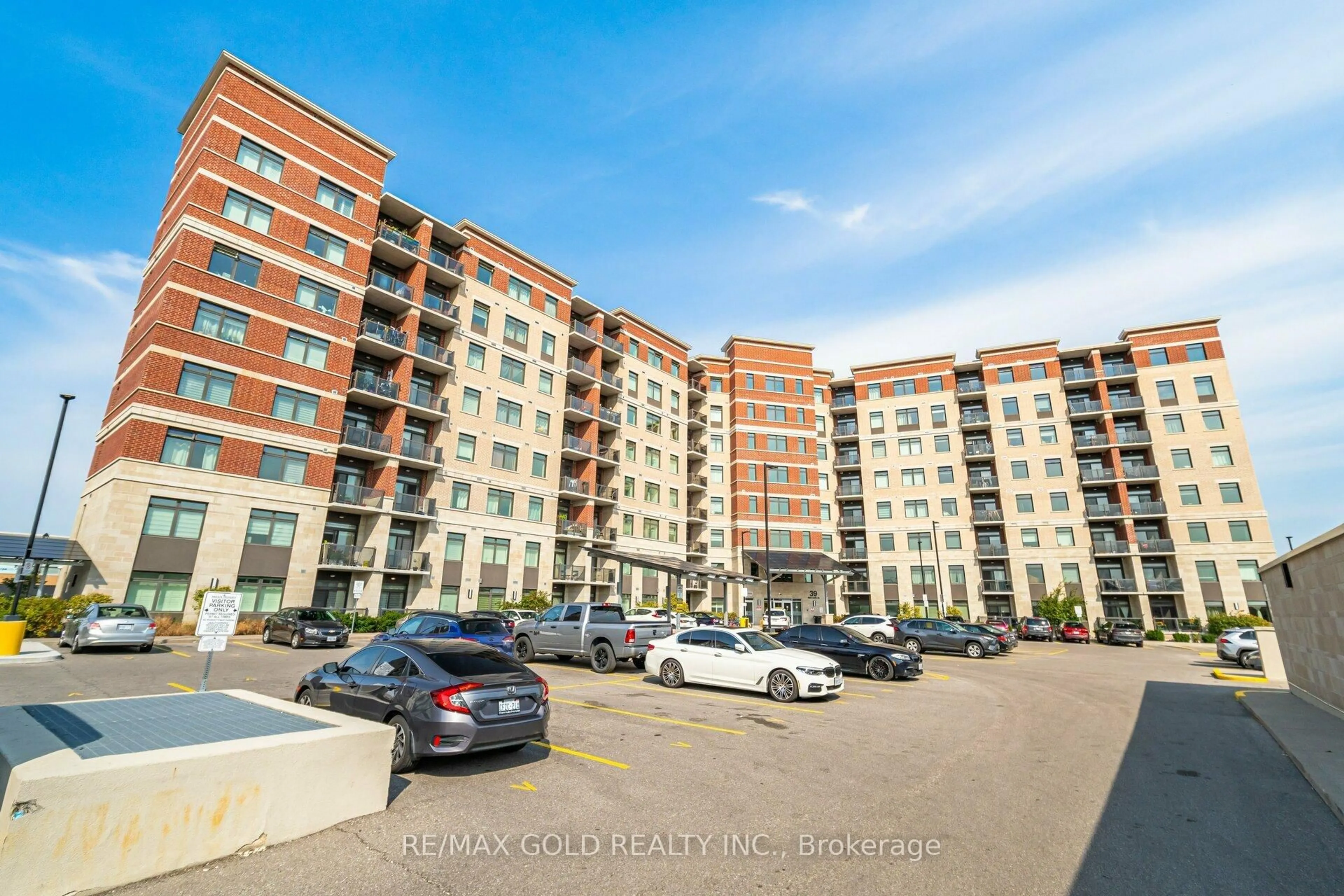 A pic from outside/outdoor area/front of a property/back of a property/a pic from drone, unknown for 39 New Delhi Dr #412, Markham Ontario L3S 0E1