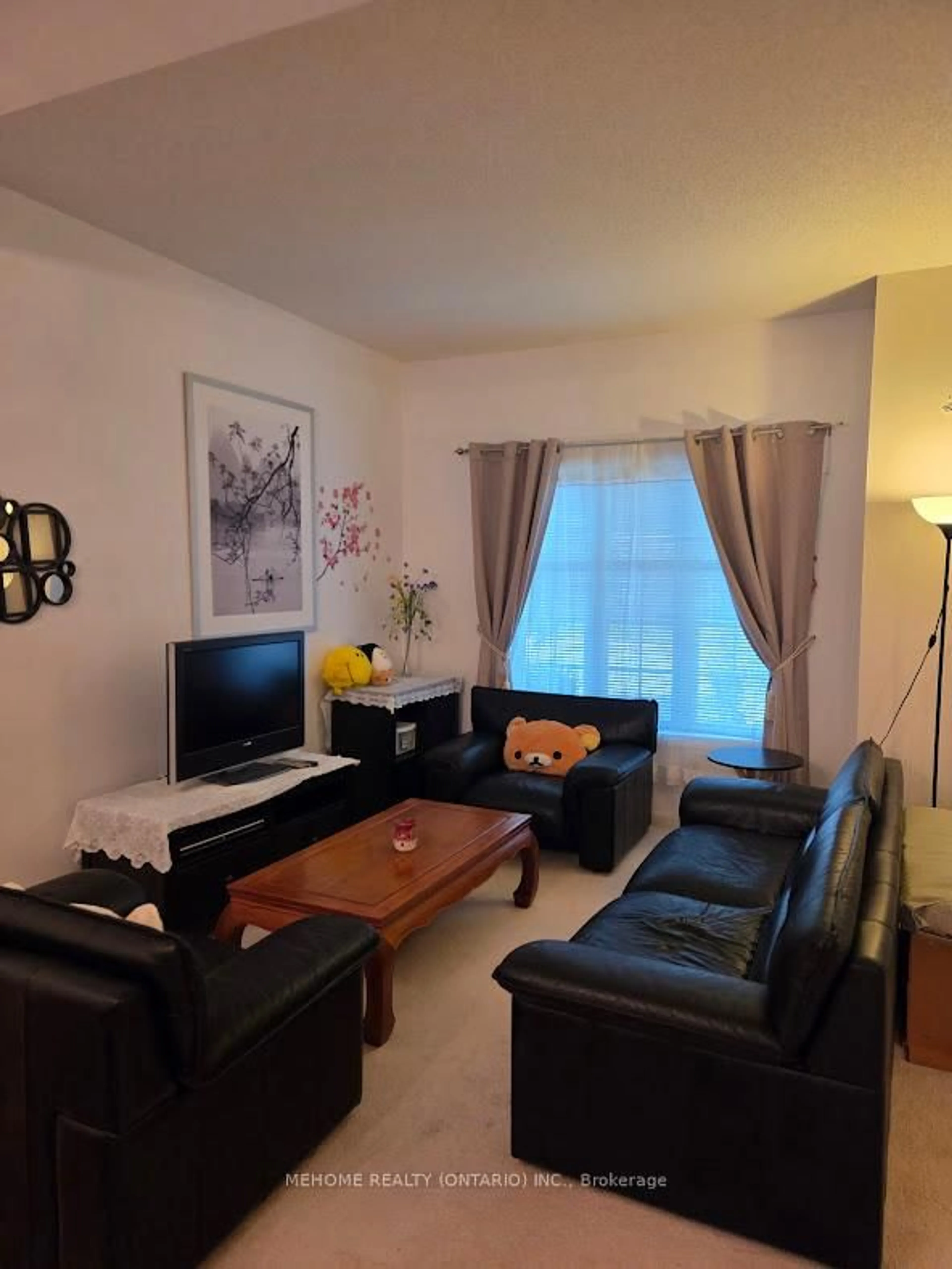Living room with furniture, unknown for 15 St Moritz Way #6, Markham Ontario L3R 4G2