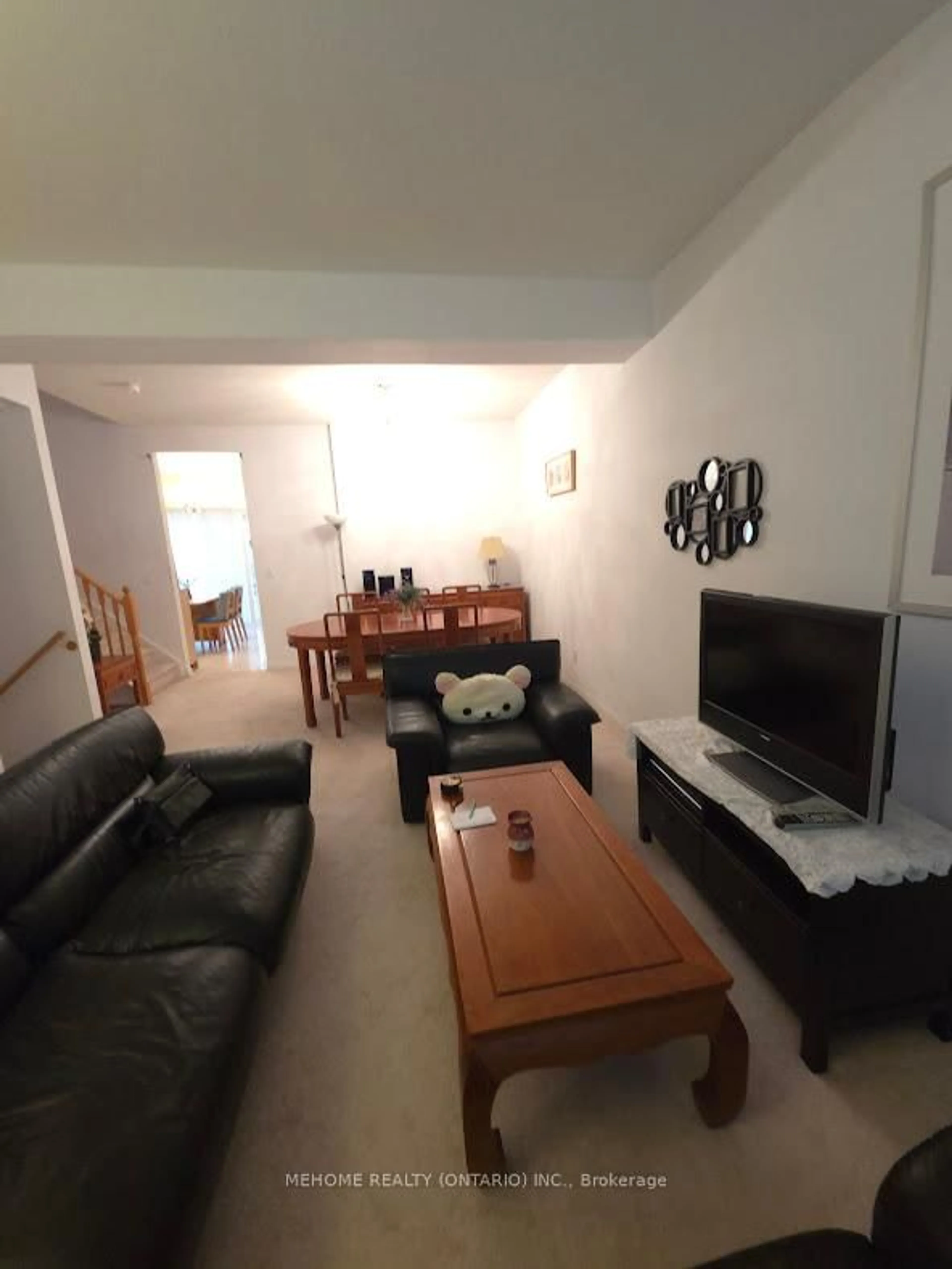Living room with furniture, unknown for 15 St Moritz Way #6, Markham Ontario L3R 4G2