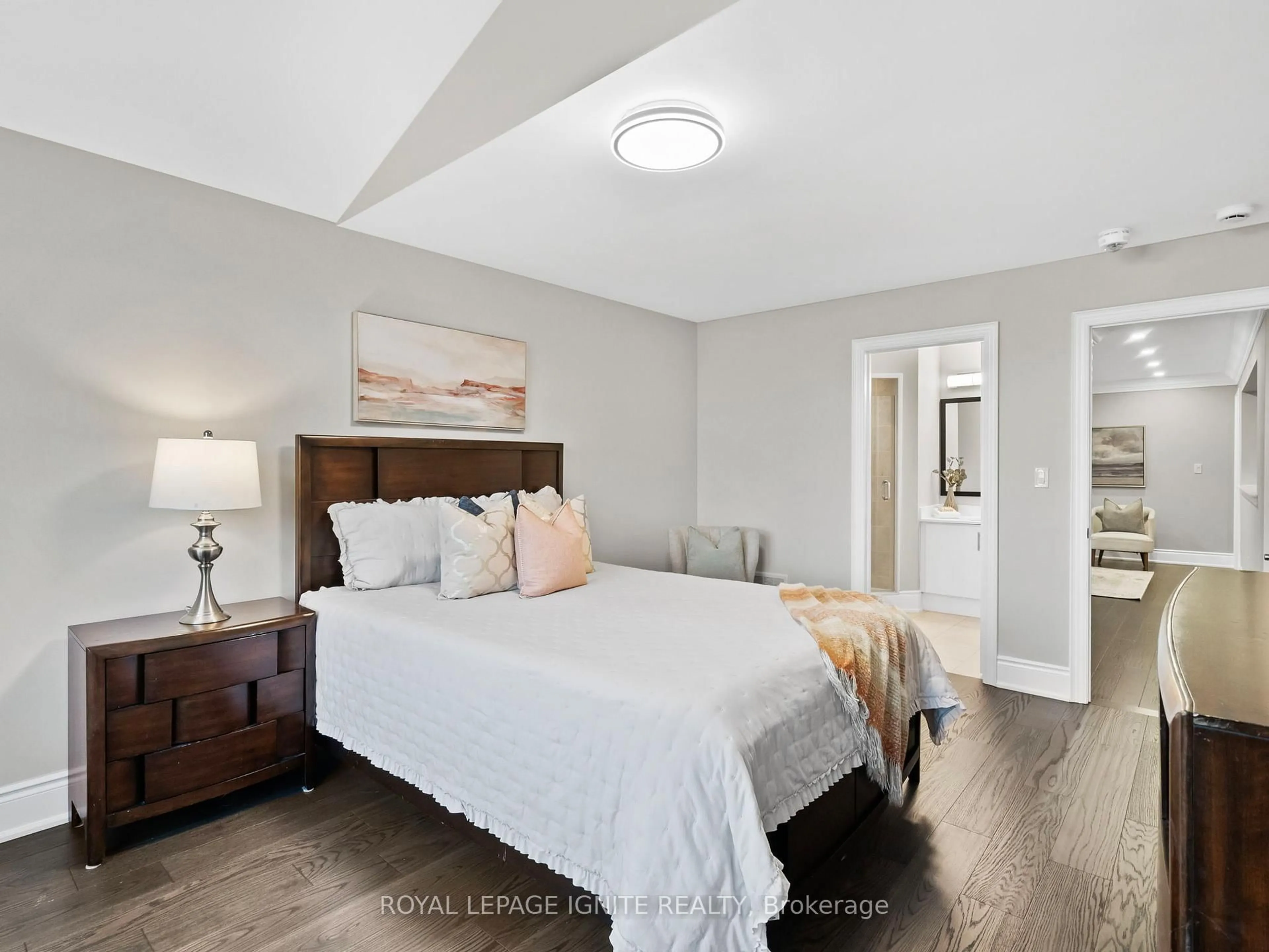 Bedroom with bed, wood/laminate floor for 32 Lewis Ave, Bradford West Gwillimbury Ontario L3Z 0W9