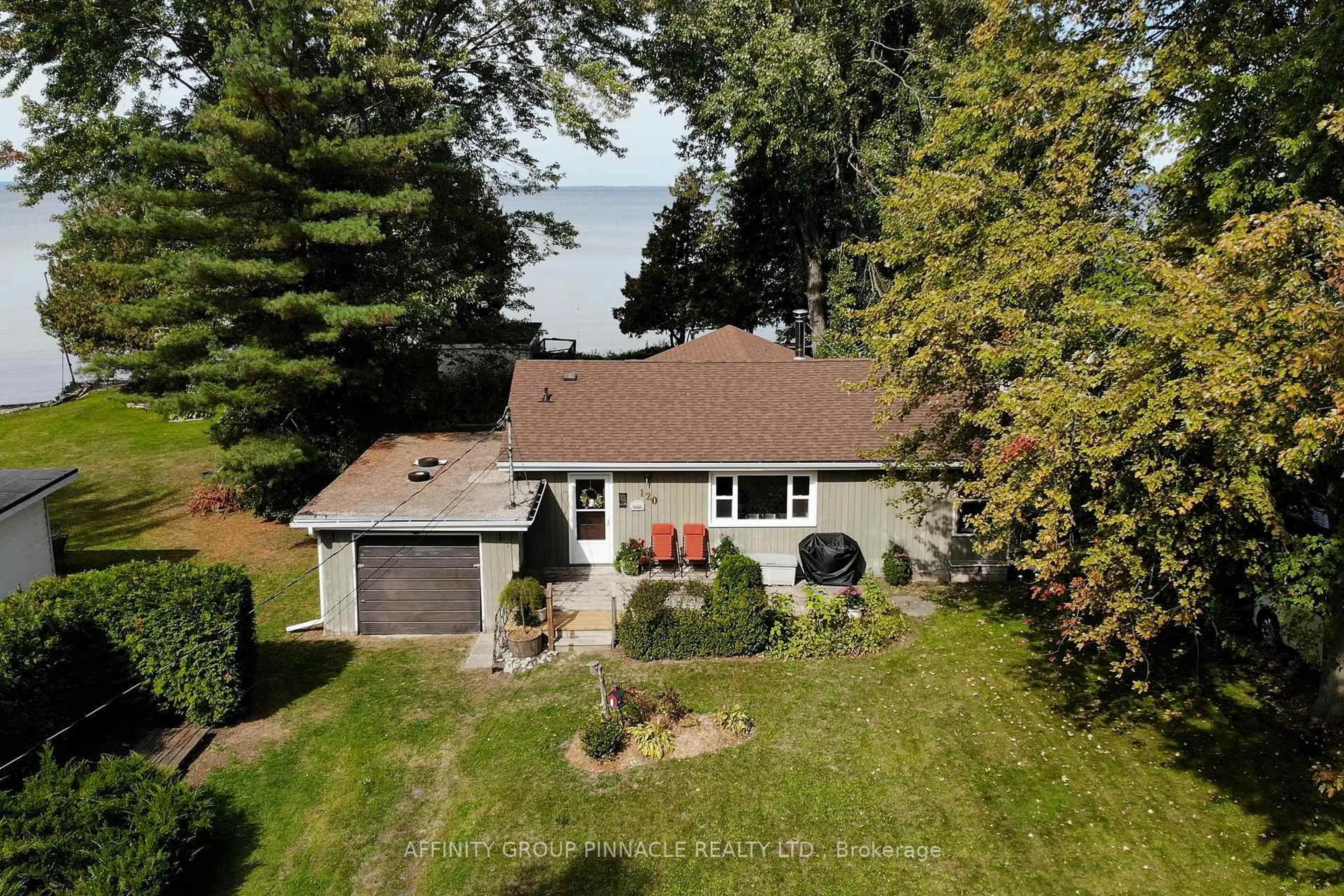 A pic from outside/outdoor area/front of a property/back of a property/a pic from drone, water/lake/river/ocean view for 120 Irving Dr, Georgina Ontario L0E 1N0